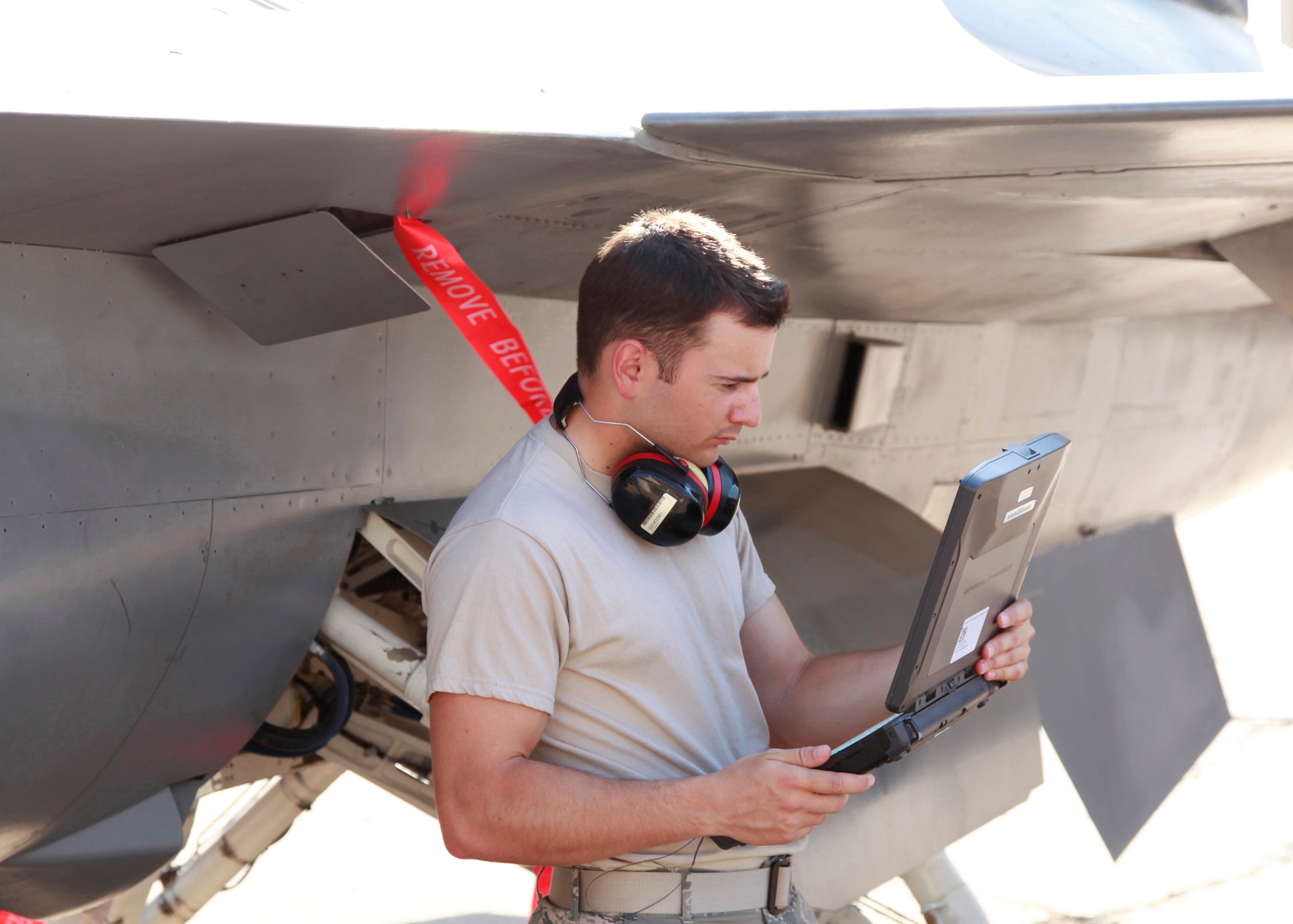 Sheppard AFB, TX Airman 1st Class Ryan Godshalk reviews the steps on how to perform Safe for electrical power on the Digital Technical Order on June 16 2011. (USAF Photo Danny Webb)