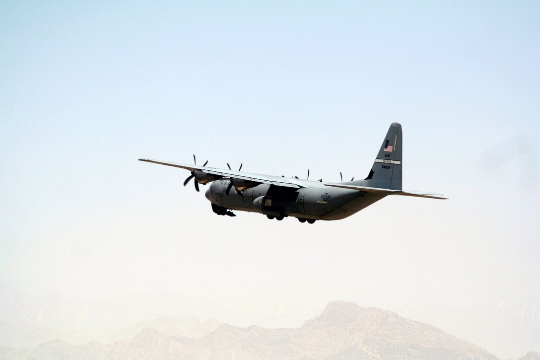 A C-130 Hercules aircraft deployed with the 774th Expeditionary Airlift Squadron takes off from Bagram Airfield, Afghanistan, on June 6, 2011.  The 774th EAS is part of the 455th Air Expeditionary Wing at Bagram Airfield. (U.S. Air Force Photo/Master Sgt. Scott T. Sturkol)