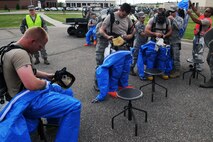 MINOT AIR FORCE BASE, N.D. -- Missile maintenance technicians from the 91st Missile Maintenance Squadron, ensure their gear is properly fitted before entering the Uniform-1 Missile Training Facility, as a part of an exercise here June 16. The exercise is designed to evaluate the response capabilities of maintenance personnel here during a simulated major accident at a launch facility. (U.S. Air force photo/Senior Airman Aaron-Forrest Wainwright)