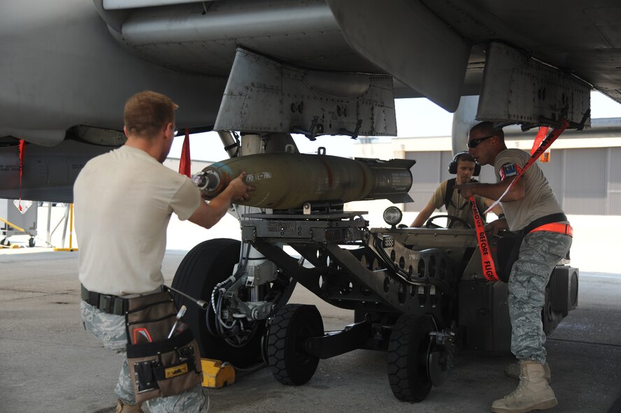 A weapons load crew from the 23rd Aircraft Maintenance Squadron unloads a Mark 82 bomb from an A-10C Thunderbolt II during an operational readiness exercise at Moody Air Force Base, Ga., June 15. The base conducted the phase II exercise to better prepare the maintenance personnel for future inspections. (U.S. Air Force photo by Airman 1st Class Paul Francis/Released)
