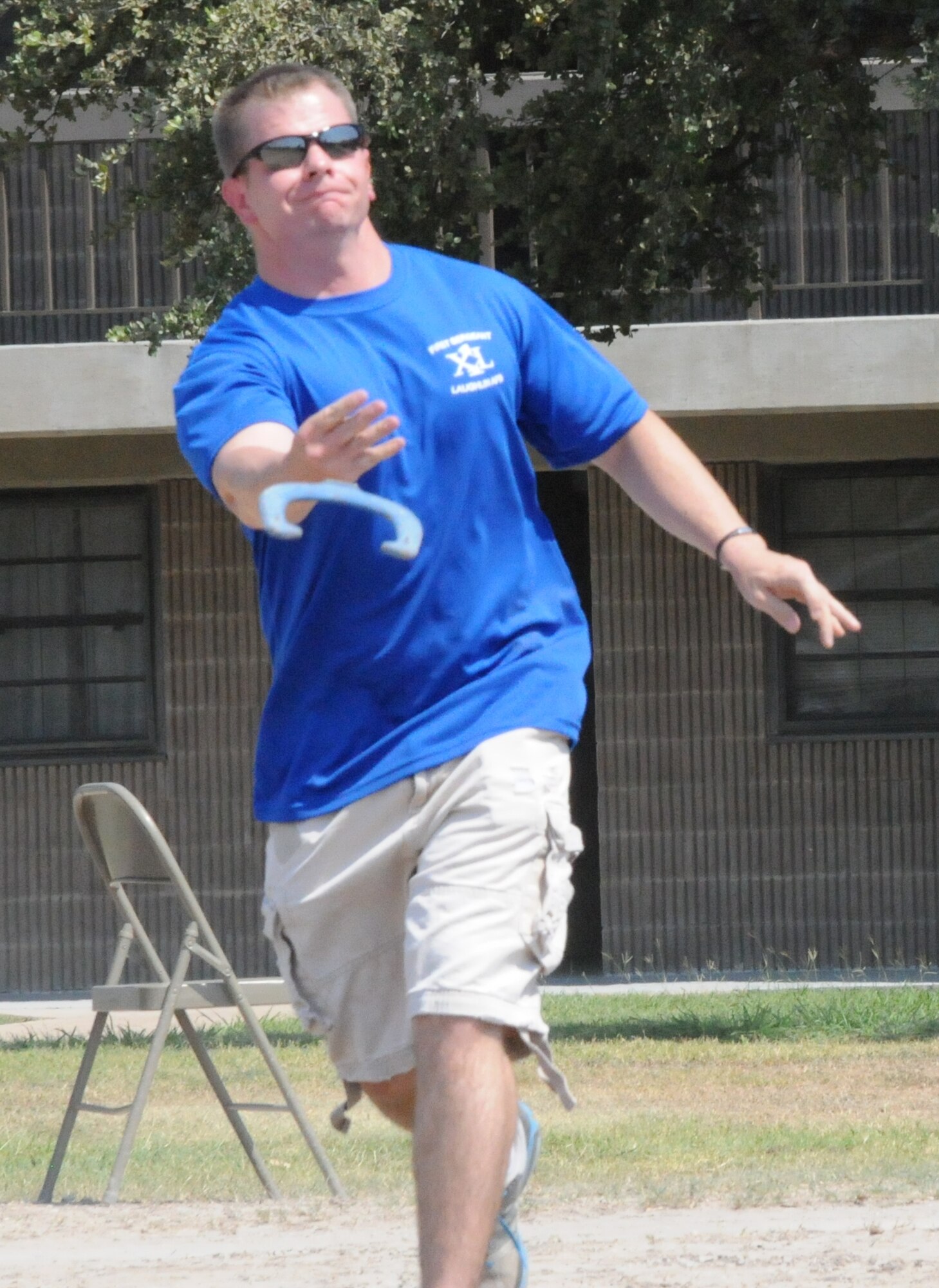 LAUGHLIN AIR FORCE BASE, Texas – Master Sgt. Jeff McGaffin, 47th Operations Group first sergeant, competes in a chief master sergeants versus first sergeants horseshoe competition at Laughlin’s enlisted dormitories June 15. The competition was won by the first sergeants. (U.S. Air Force photo by Eddie Martinez)