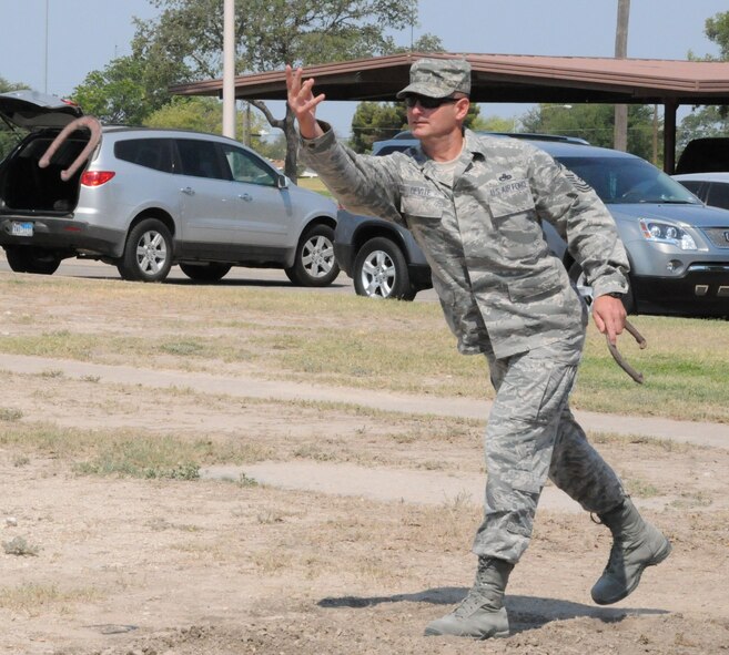 LAUGHLIN AIR FORCE BASE, Texas – Chief Master Sgt. Ray DeVite, 47th Flying Training Wing command chief, competes in a chief master sergeants versus first sergeants horseshoe competition at Laughlin’s enlisted dormitories June 15. The competition was won by the first sergeants. (U.S. Air Force photo by Eddie Martinez)