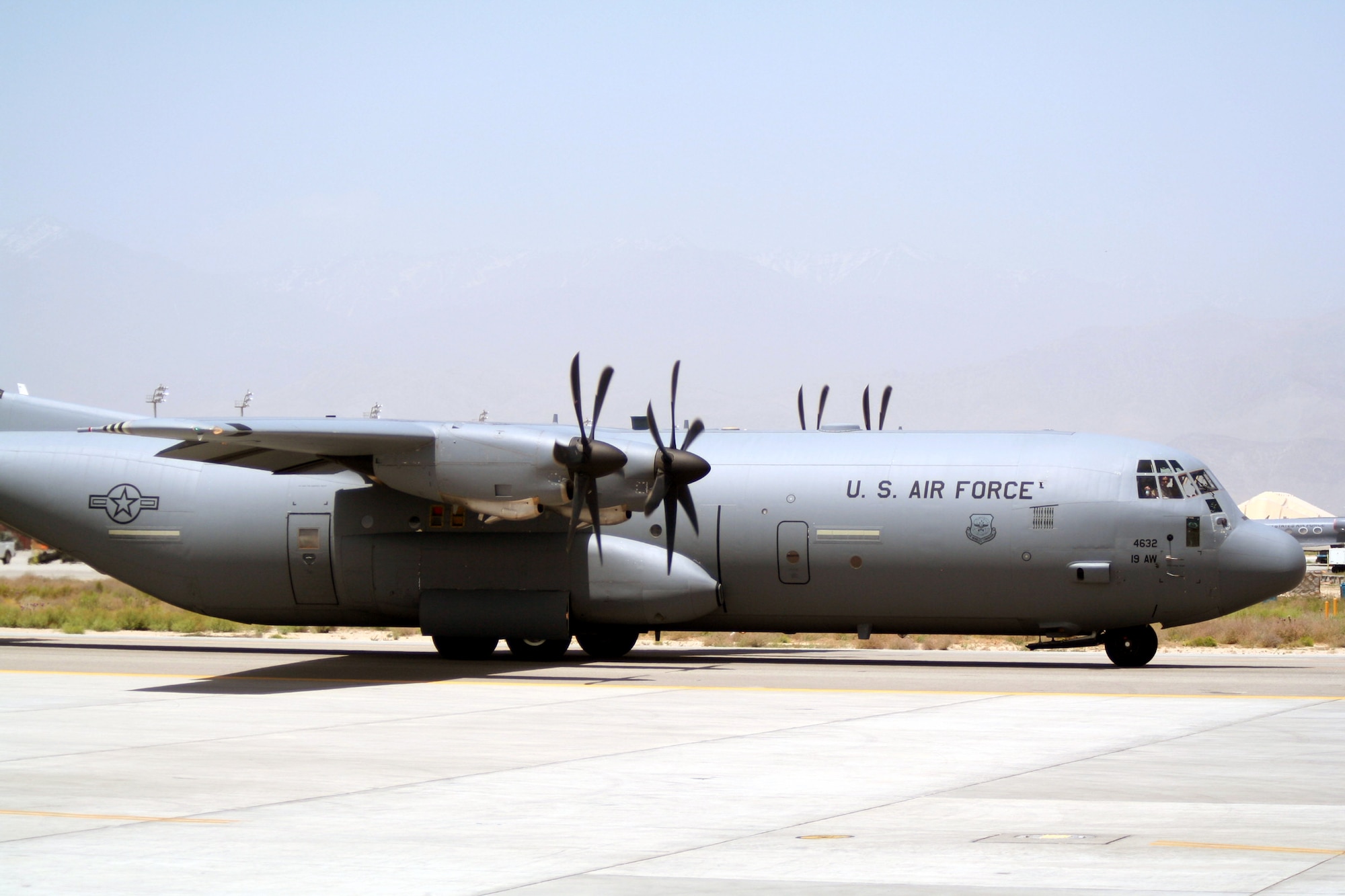 A C-130 Hercules deployed with the 774th Expeditionary Airlift Squadron taxis on the flightline on its way to complete a combat airlift mission at Bagram Airfield, Afghanistan, on June 6, 2011.  The 774th EAS is part of the 455th Air Expeditionary Wing at Bagram Airfield. (U.S. Air Force Photo/Master Sgt. Scott T. Sturkol)
