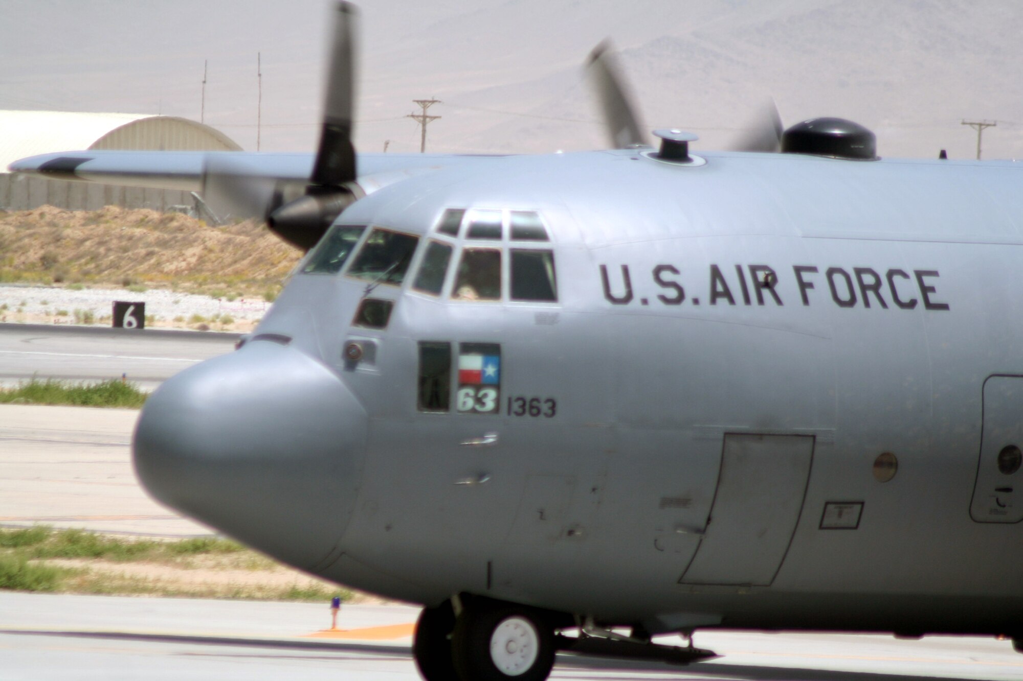 A C-130 Hercules deployed with the 774th Expeditionary Airlift Squadron taxis on the flightline after competing a combat airlift mission at Bagram Airfield, Afghanistan, on June 6, 2011.  The 774th EAS is part of the 455th Air Expeditionary Wing at Bagram Airfield. (U.S. Air Force Photo/Master Sgt. Scott T. Sturkol)