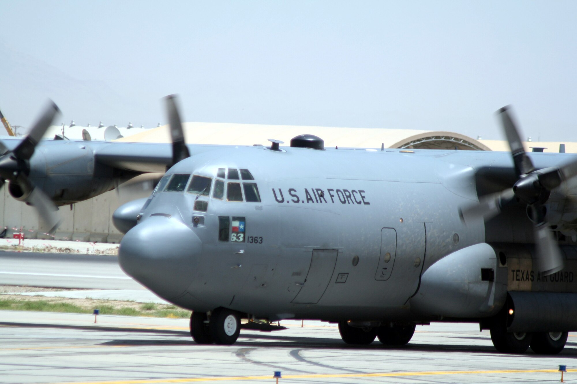 A C-130 Hercules deployed with the 774th Expeditionary Airlift Squadron taxis on the flightline after competing a combat airlift mission at Bagram Airfield, Afghanistan, on June 6, 2011.  The 774th EAS is part of the 455th Air Expeditionary Wing at Bagram Airfield. (U.S. Air Force Photo/Master Sgt. Scott T. Sturkol)