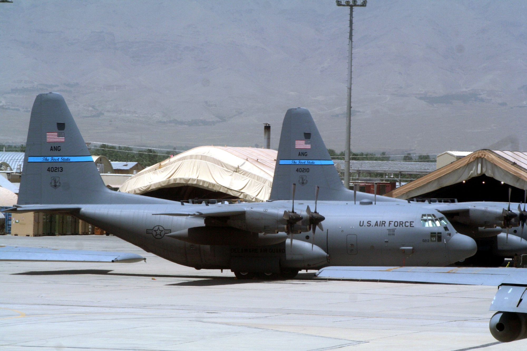 C-130 Hercules aircraft deployed with the 774th Expeditionary Airlift Squadron are shown on the flightline at Bagram Airfield, Afghanistan, on June 6, 2011.  The 774th EAS is part of the 455th Air Expeditionary Wing at Bagram Airfield. (U.S. Air Force Photo/Master Sgt. Scott T. Sturkol)