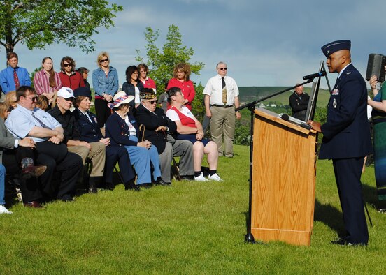 Brig. Gen. (Sel) Anthony Cotton, 341st Missile Wing commander, speaks to members of the Great Falls community attending the Flag Day ceremony held June 14.  Flag Day is recognized across the nation as the one day a year to pay respects to Old Glory.  (U.S. Air Force photo/Airman Cortney Hansen)