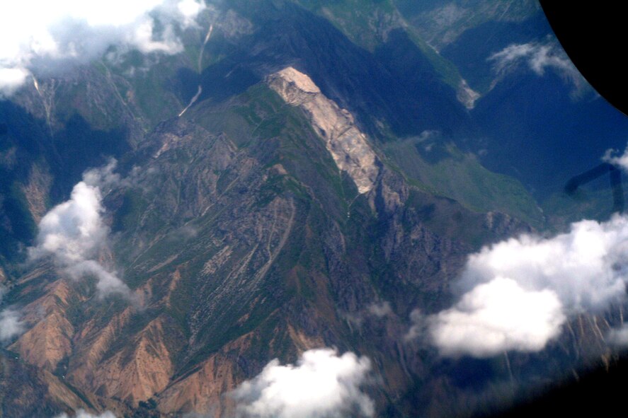 The countryside of Afghanistan can be seen through the window of a C-5M Super Galaxy during an airlift mission on June 6, 2011.  The C-5M was on the first direct delivery airlift mission that went through the Arctic Circle from Dover Air Force Base, Del., to Bagram Airfield, Afghanistan, between June 5-6, 2011. (U.S. Air Force Photo/Master Sgt. Scott T. Sturkol)