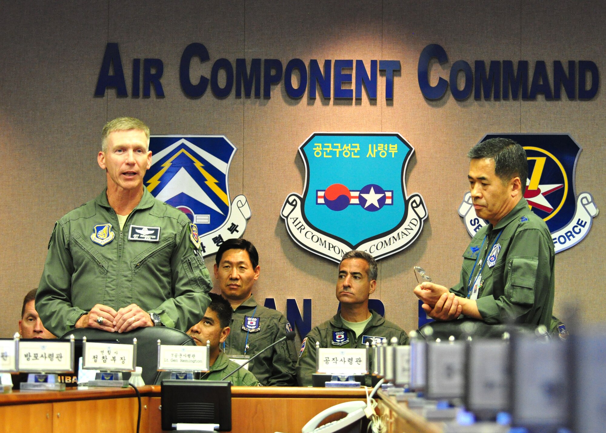 Lt. Gen. Jeffrey A. Remington, Air Component Command commander, and his deputy, Korean Air Force Lt. Gen. Lee, Yeong Man, gave opening remarks during the annual Air Boss Conference here June 15. General Remington said this conference affords the opportunity for other leaders around the world to bring their expertise to the table, learn from each other, and take advantage of a forum such as this to further integrate all organizations into a seamless war-fighting machine. (U.S. Air Force photo/Staff Sgt. Chad Thompson)