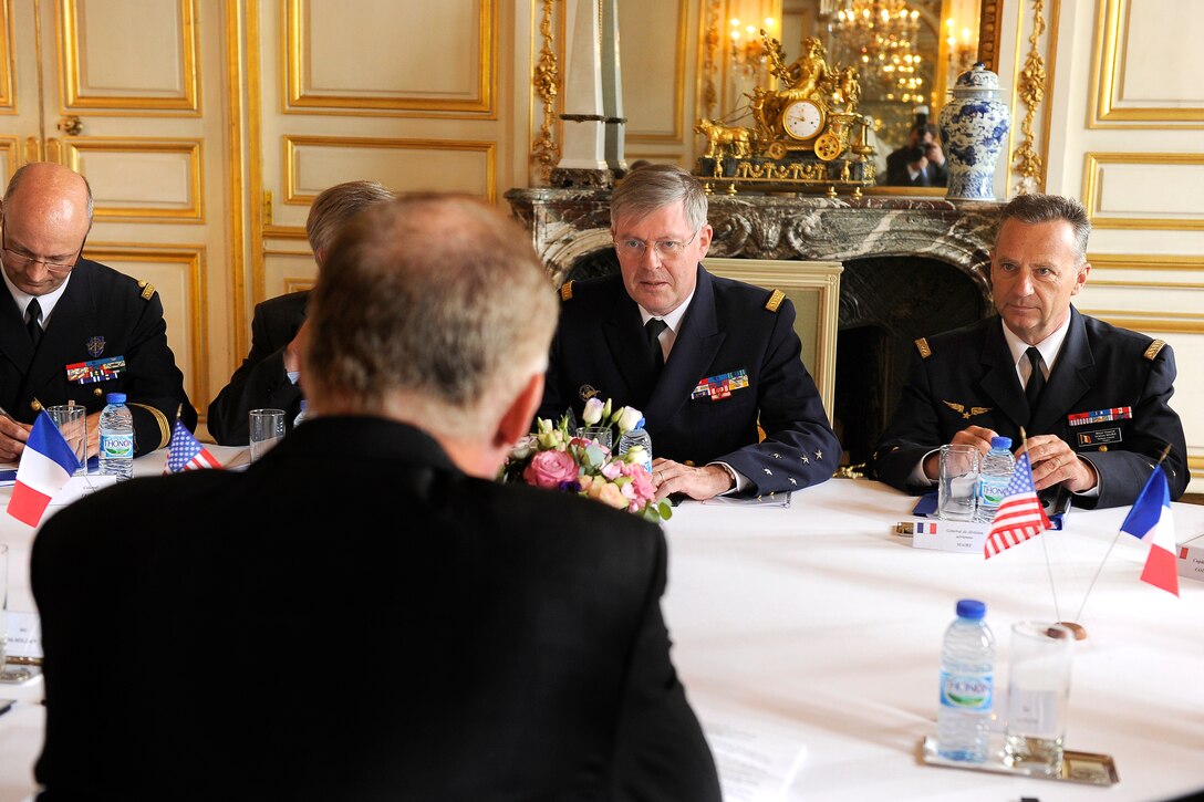 French Chief of the Defense Staff Adm. Edouard Guillaud, second from right, begins a meeting with U.S. Deputy Defense Secretary William J. Lynn III at the Ecole Militaire in Paris, June 17, 2011.