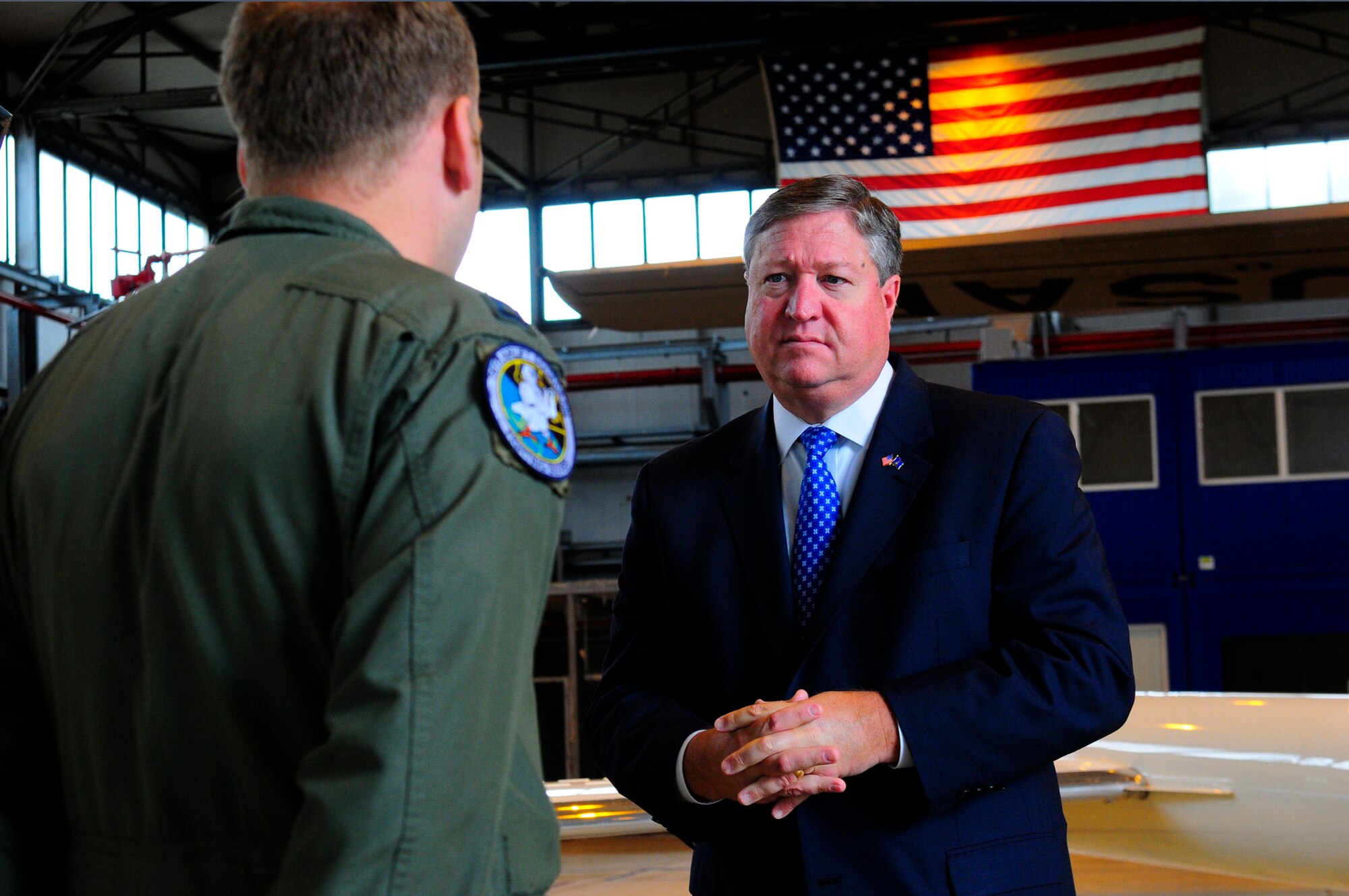 U.S. Air Force Capt. Daniel Helland, 76th Airlift Squadron, briefs Secretary of the Air Force Michael Donley on C-21 aircraft aeromedical evacuation procedures on Ramstein Air Base, Germany, June 18, 2011. The secretary traveled to Europe to meet with Airmen and receive updates from command leadership on U.S. Air Force Europe efforts to build partnership capacity and ongoing contingency support for Operation Unified Protector. (U.S. Air Force Photo by Airman 1st Class Brea Miller)
