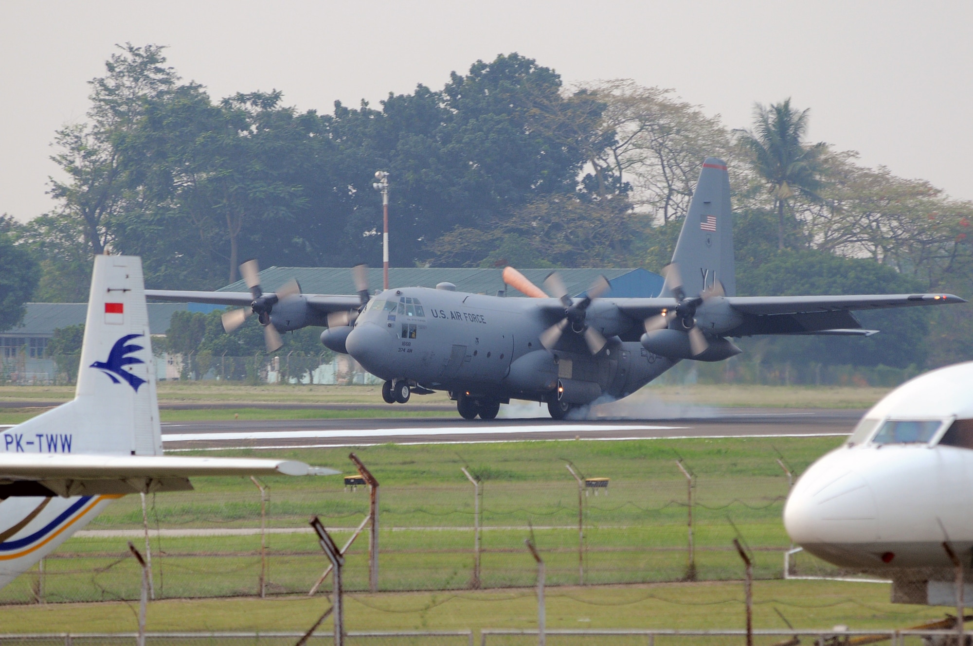 HALIM AIR BASE, Indonesia -- A C-130 Hercules from the 36th Airlift Squadron at Yokota Air Base, Japan, arrives safely at Halim Air Base, Indonesia, to take part in Exercise Cope West 11, June 18, 2011. Three Yokota C-130 aircraft and more than 70 Yokota airmen, as well as one Indonesian Air Force C-130 will participate in the week-long, bilateral field training exercise which is designed to enhance the readiness and combined interoperability between the U.S. and Indonesian Air Forces. (U.S. Air Force photo/Capt. Raymond Geoffroy)