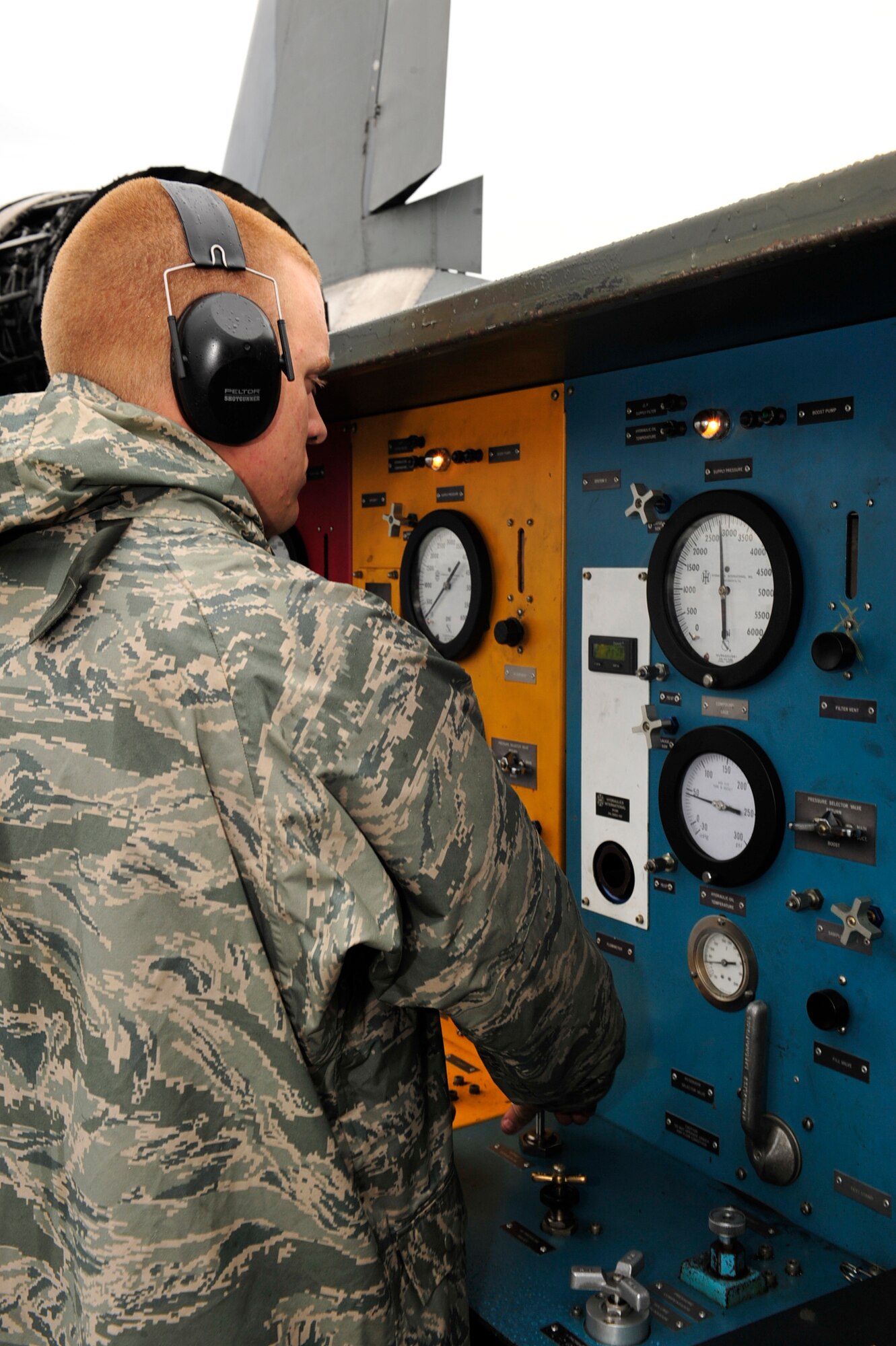 U.S. Air Force Airman 1st Class Kevin Buff, a crew chief with the 18th Aircraft Maintenance Squadron, Kadena Air Base, Japan, operates a hydraulic test stand during the Northern Edge Premier Joint Training Exercise at Eielson Air Force Base, Alaska, June 20. More than 6,000 active duty, Reserve and National Guard personnel are participating in Northern Edge 2011. (U.S. Air Force photo/ Staff Sgt. Lakisha A. Croley)