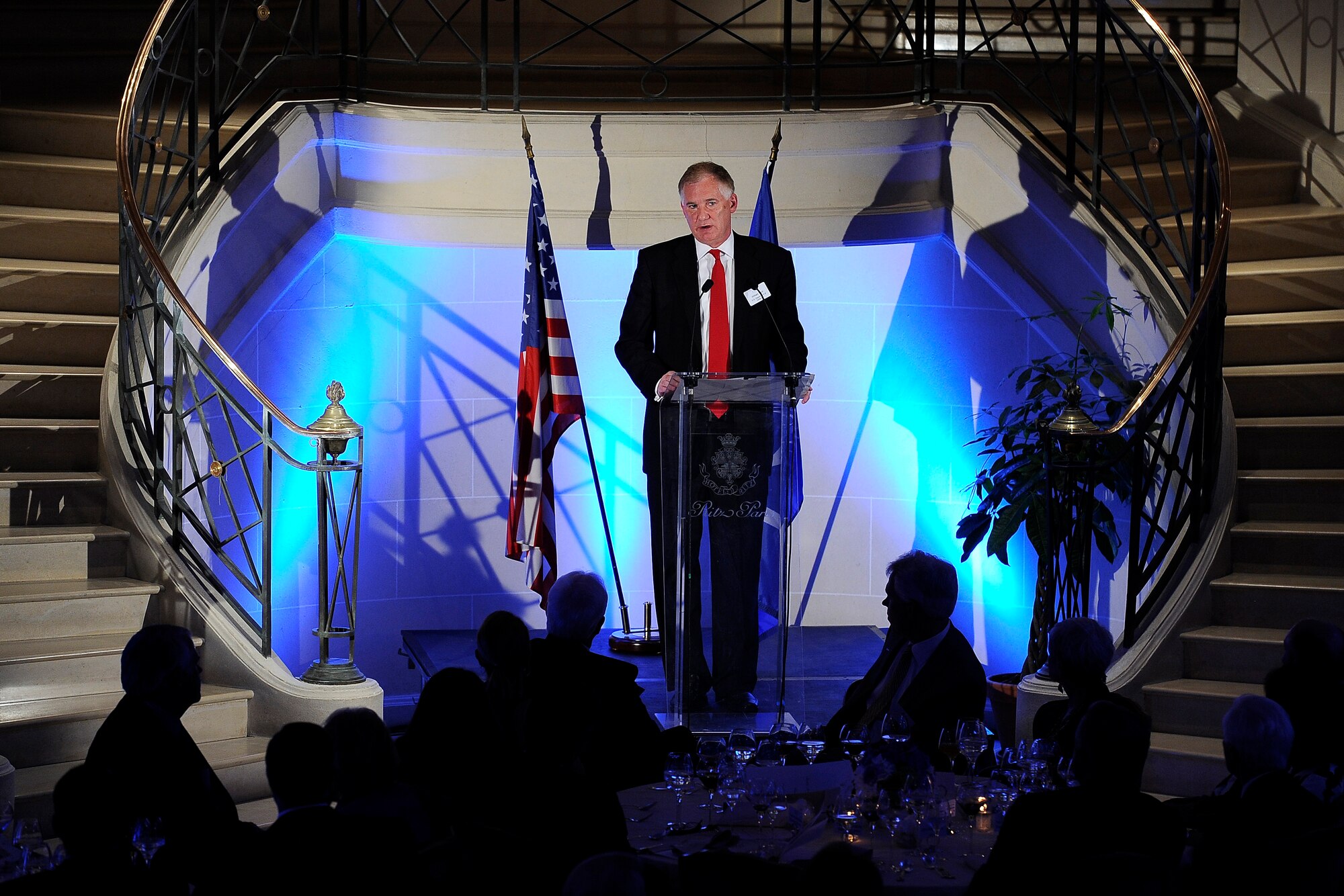 Deputy Secretary of Defense William J. Lynn addresses the audience at the Aerospace Industry Association dinner in Paris, France, June 19, 2011.  He used a letter from nine-year-old boy named Hunter to reflect on the challenges and opportunities the nation faces with national security in an era of fiscal austerity.  (Defense Department photo/Terry Mitchell)