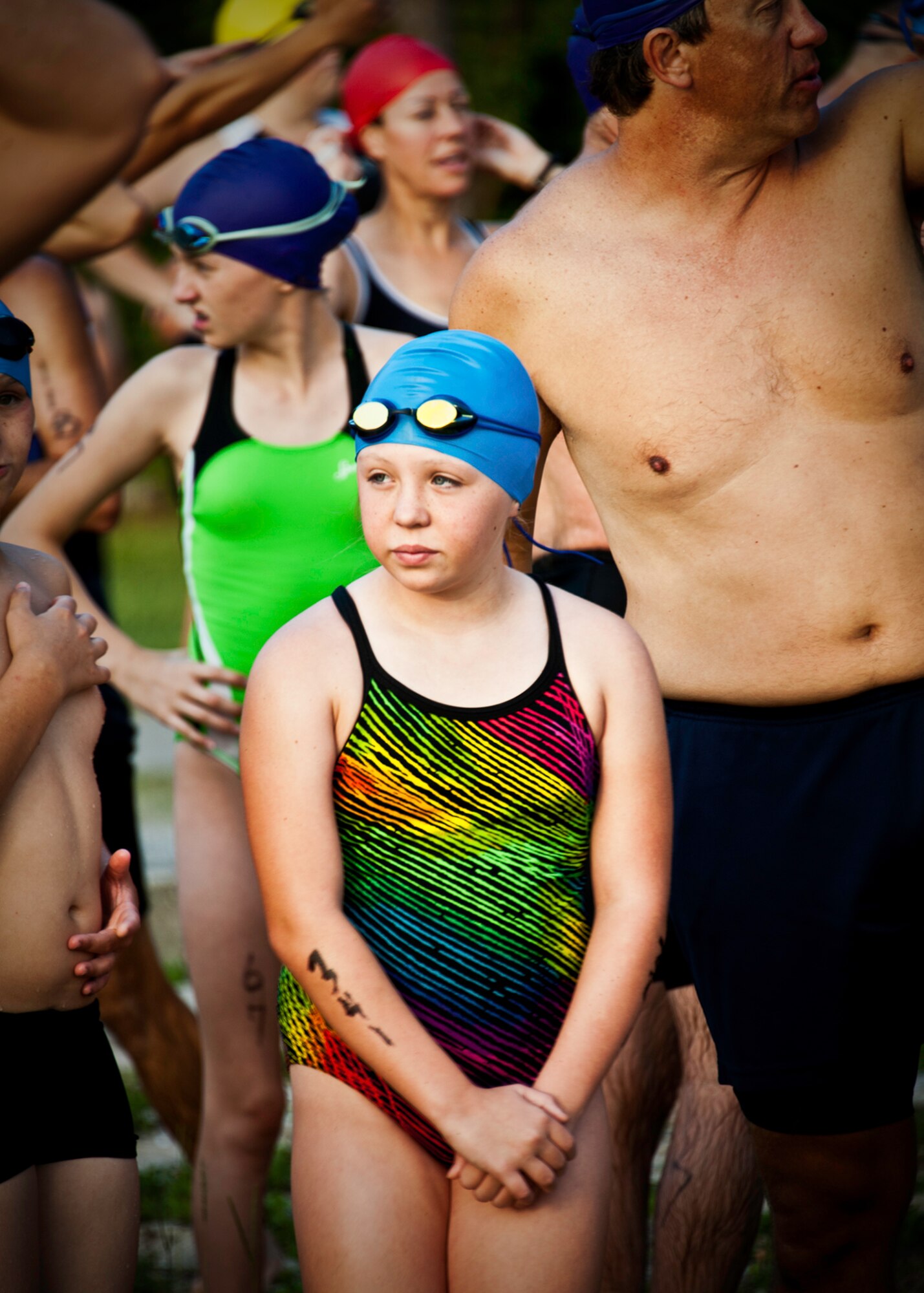 Katie Balent, age 11, was one of the first to enter the water and the race at this year’s “My First Tri” triathlon at Eglin Air Force Base Fla., June 18.  Almost 350 people of all ages “tried” at the 12th annual event.  The triathlon consists of a 200-meter swim, eight-mile bike ride, then a 2.5-mile run.  David Shearon finished with the best overall time - 39 minutes 24 seconds.  Wendy Ewing had the best time for females with 47 minutes 39 seconds. (U.S. Air Force photo/Samuel King Jr.)