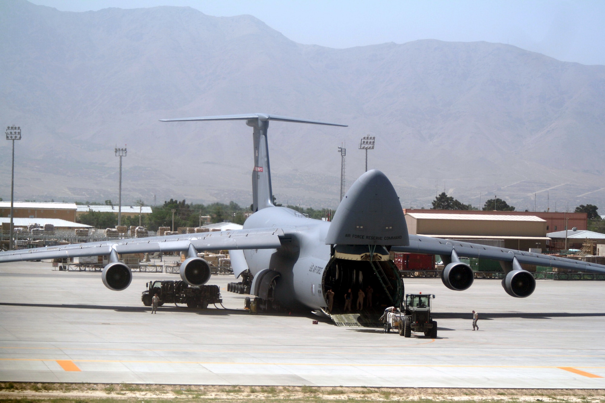 Airmen work on a C-5 Galaxy at Bagram Airfield, Afghanistan, on June 6, 2011. The C-5 is the Air Force's largest airlift aircraft. (U.S. Air Force Photo/Master Sgt. Scott T. Sturkol)