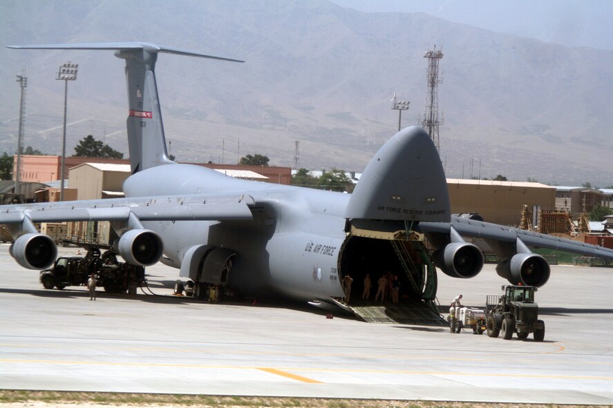 Airmen work on a C-5 Galaxy at Bagram Airfield, Afghanistan, on June 6, 2011. The C-5 is the Air Force's largest airlift aircraft. (U.S. Air Force Photo/Master Sgt. Scott T. Sturkol)