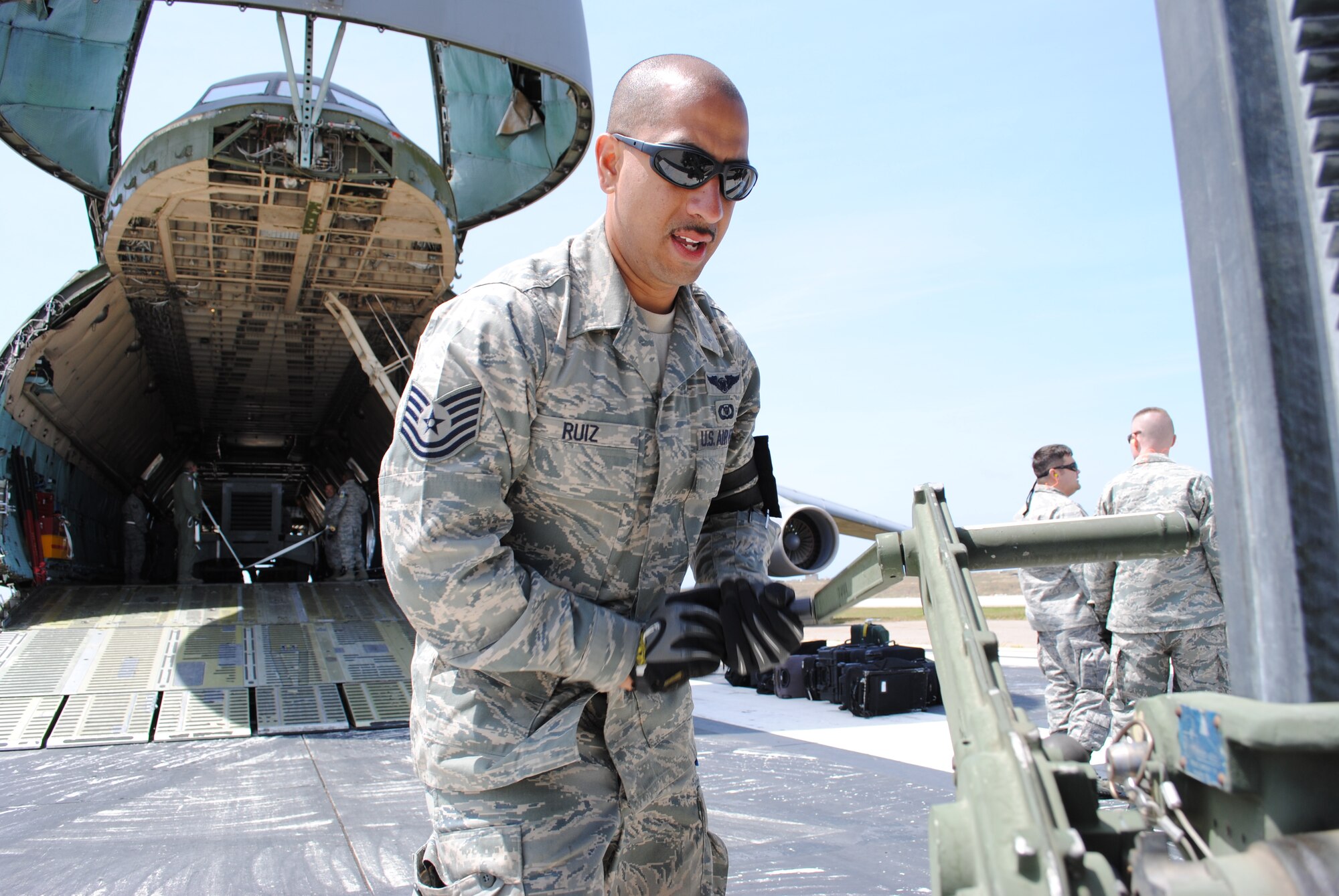 Tech. Sgt. Jose Ruiz helps level out a portable communication and operations building by cranking up one of the corner jacks moments after he and other Airmen from the 433rd Airlift Control Flight touched down on the flightline at Naval Auxiliary Landing Field San Clemente Island, Calif. Ruiz joined several Airmen from the 433 AW who took part in Patriot Hook 2011. 

Patriot Hook is a large-scale air mobility exercise involving Air Force Reserve Command airlift control flights, flying units and aerial port personnel. Exercise participants conduct deployment-type operations from three primary locations California; North Island Naval Air Station, Point Mugu and Naval Auxiliary Landing Field San Clemente Island. (U.S. Air Force photo/Senior Airman Luis Loza Gutierrez)