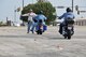 Kyle Rausch, Navy rider-coach, conducts training for advanced rider course June 10. Mr. Rausch, along with other potential rider-coach candidates, participated in certification courses for teaching the advanced rider course the same day riders qualified for the advanced rider course. Lisa Johnson, traffic safety specialist from the Navy Safety Center in Norfolk, Va., conducted joint training between Air Force and Naval rider-coaches. Motorcycle safety course information can be found on the Tinker home page. (Air Force photo by Brian Schroeder)