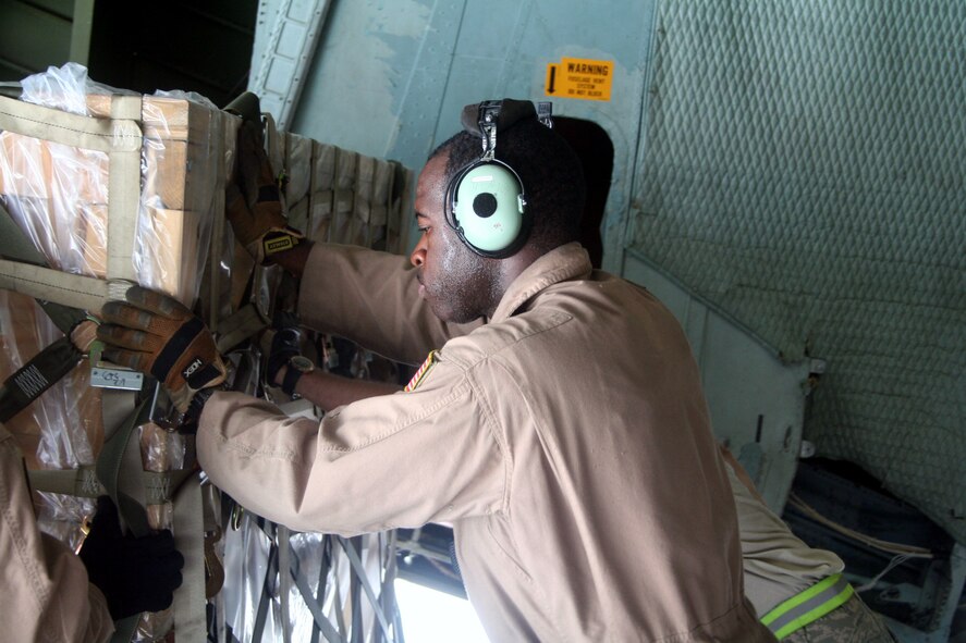 Staff Sgt. Norterious Jenkins, C-5 Galaxy loadmaster, works in a C-5M Super Galaxy on June 6, 2011, at Bagram Airfield, Afghanistan. Sergeant Jenkins was part of a direct delivery airlift mission through the Arctic Circle from Dover Air Force Base, Del., to Bagram Airfield, Afghanistan. He is from the 9th Airlift Squadron at Dover AFB and his hometown is Columbia, S.C.  (U.S. Air Force Photo/Master Sgt. Scott T. Sturkol)