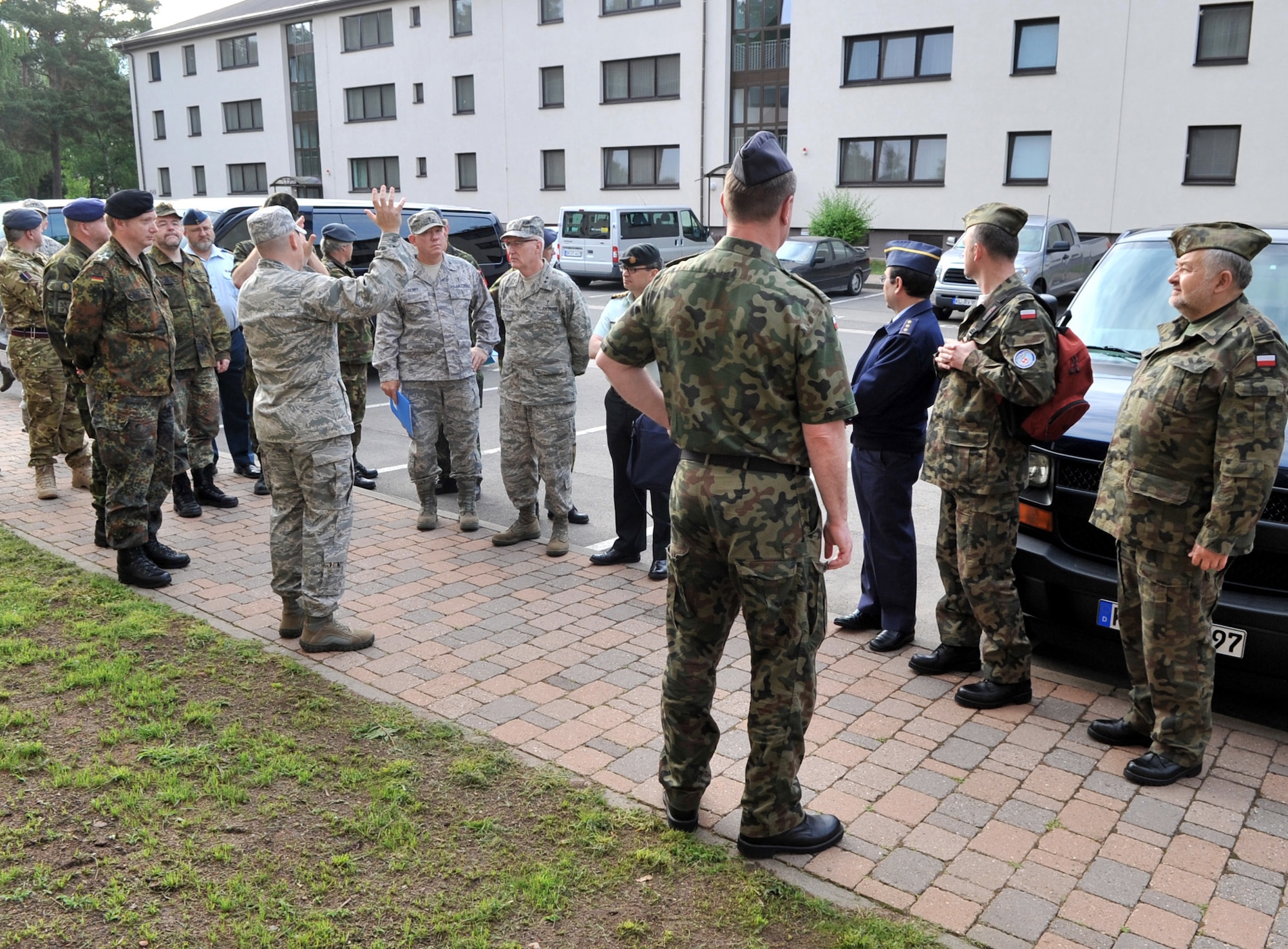 Chaplain (Capt.) Christopher Conklin briefs Chaplain (Maj. Gen.) Cecil R. Richardson and other NATO chaplains June 16, 2011, during the NATO Allied Air Force Chaplains Consultative Committee Conference at Ramstein Air Base, Germany. Chaplain Conklin is the 86th Airlift Wing Deployment Transition Center chaplain. Chaplain Richardson is the U.S. Air Force chief of chaplains. (U.S. Air Force photo/Senior Airman Caleb Pierce)