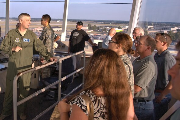 Col. Mark Camerer, 436th Airlift Wing commander, explains Dover Air Force Base, Del.’s, mission to local landowners June 15, 2011, at the control tower. Landowners were in the tower as part of Land Owner Appreciation Day to thank them for allowing access to their land to keep wildlife off the flightline. (U.S. Air Force Photo/Senior Airman Matthew Hubby)