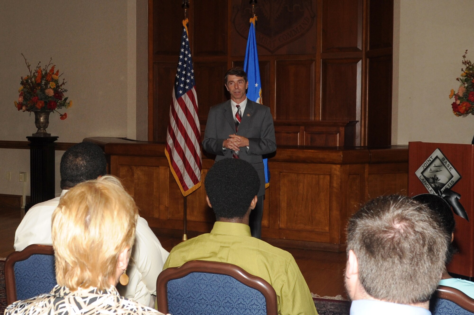 Congressman Robert Wittman, U.S. Representative for Virginia’s 1st congressional district, expresses his gratitude to Chester Ellis Jr., for his father’s military service during a flag folding ceremony in honor of his father, Chester Ellis Sr., at Langley Air Force Base, Va., June 17, 2011. In honor of Chester Ellis Sr., the U.S. flag was flown over the nation’s capital in his honor before being presented to his son. (U.S. Air Force photo by Airman 1st Class Racheal Watson/Released)