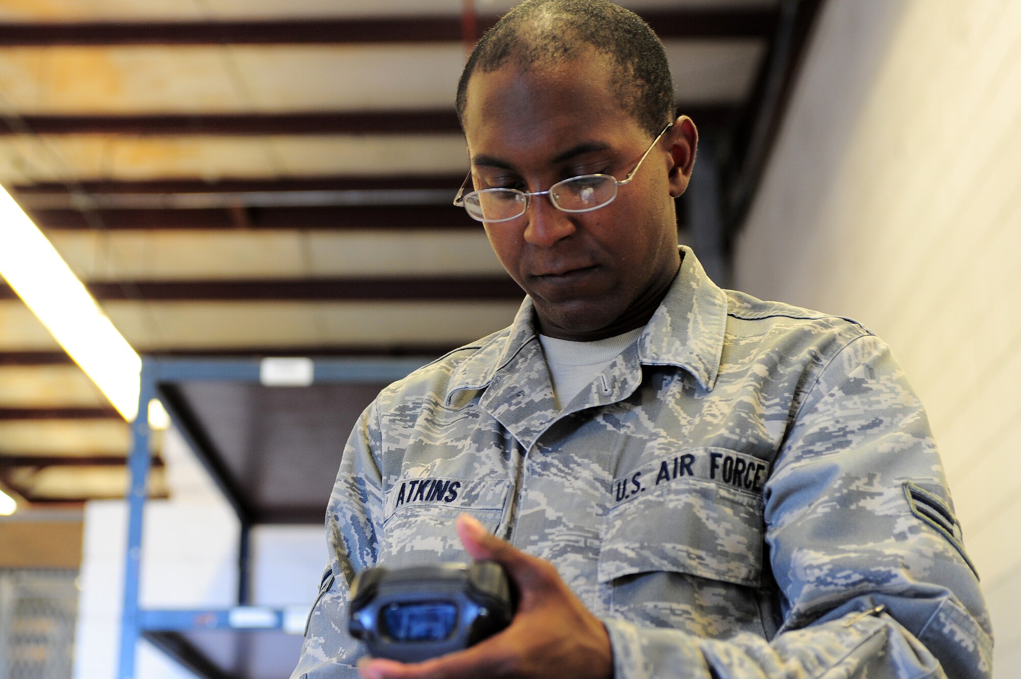 SHAW AIR FORCE BASE, S.C. -- Airman 1st Class Steve Atkins, 20 Logistics Readiness Squadron material management, inputs parts store products into their database through his scanner June 20, 2011. Airman Atkins is the Warrior of the Week for the week of June 20 through 24. (U.S. Air Force photo/ Airman 1st Classs Daniel Phelps)