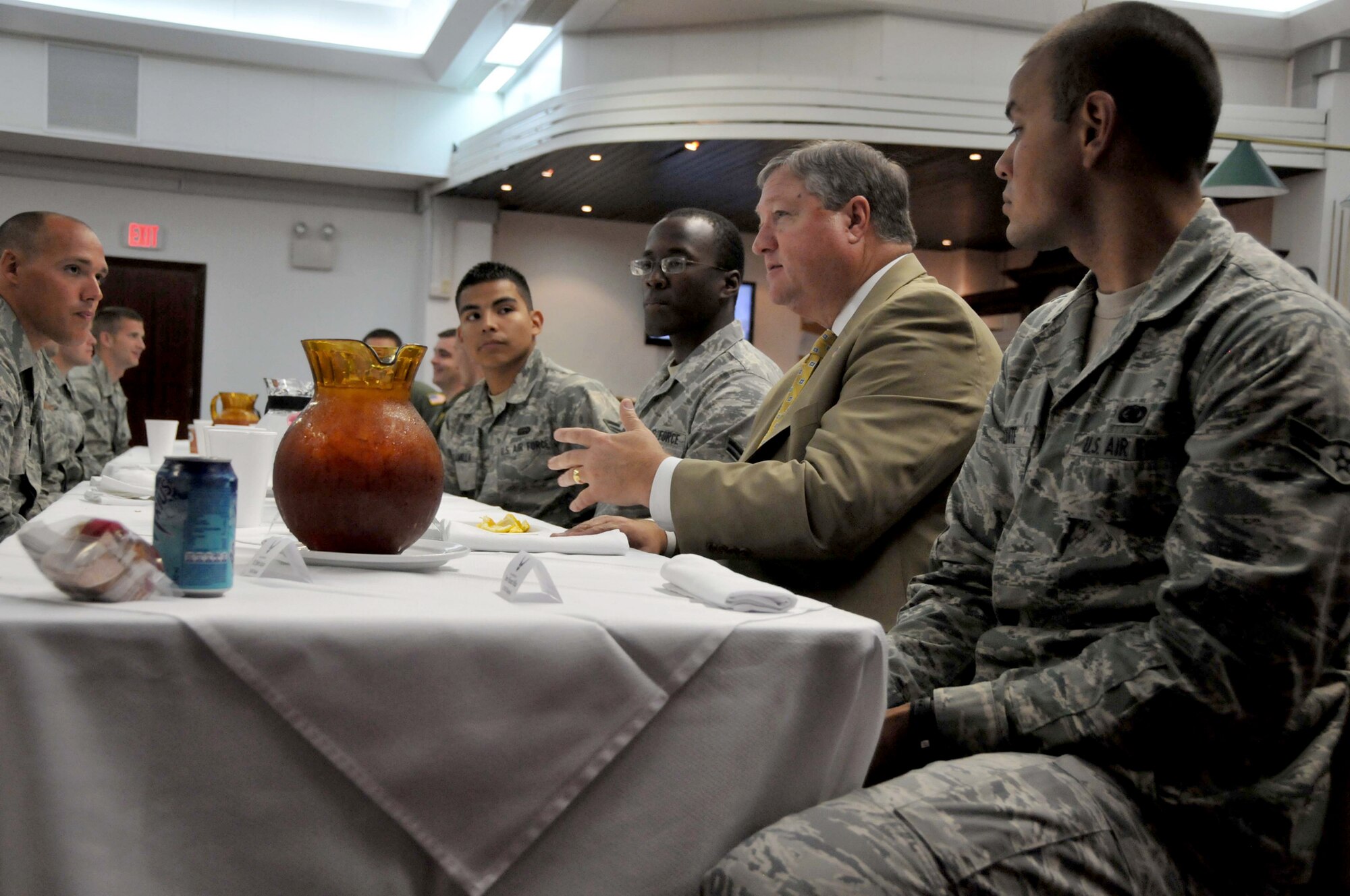 Secretary of the Air Force Michael Donley answers questions during a lunch with Airmen from the 496th Air Base Squadron June 17, 2011, in Western Europe. (U.S. Air Force photo/Capt. John P. Capra)