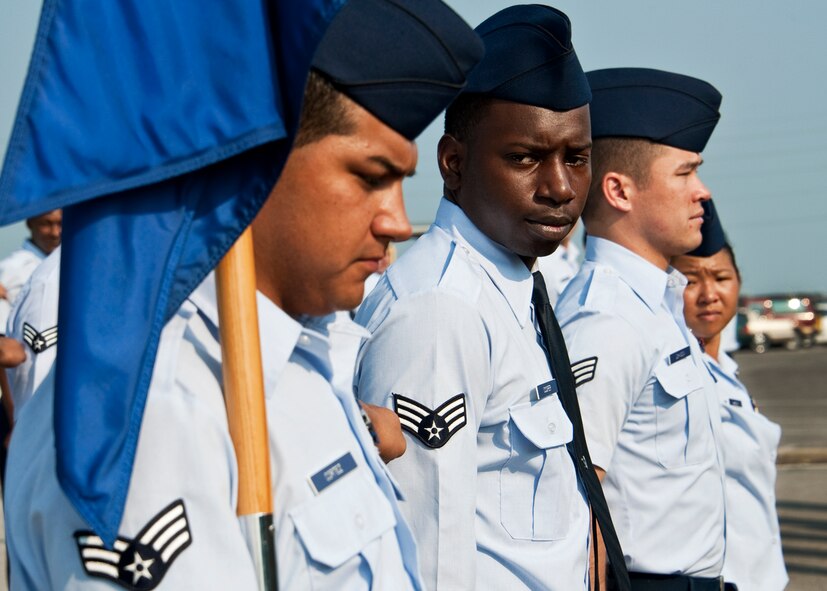 Airmen from Talon flight perform a dress-right-dress movement prior to their open ranks blues inspection at Eglin Air Force Base, Fla.  The Airmen attend Airman Leadership School, a five-week-long Air Force program designed to develop Airmen into effective front-line supervisors. It is the first professional military education enlisted Air Force members encounter. Eglin's schoolhouse hosts seven ALS classes per year. Eglin was named Air Force Materiel Command's PME program of the year for 2009 and 2010.  (U.S. Air Force photo/Samuel King Jr.)