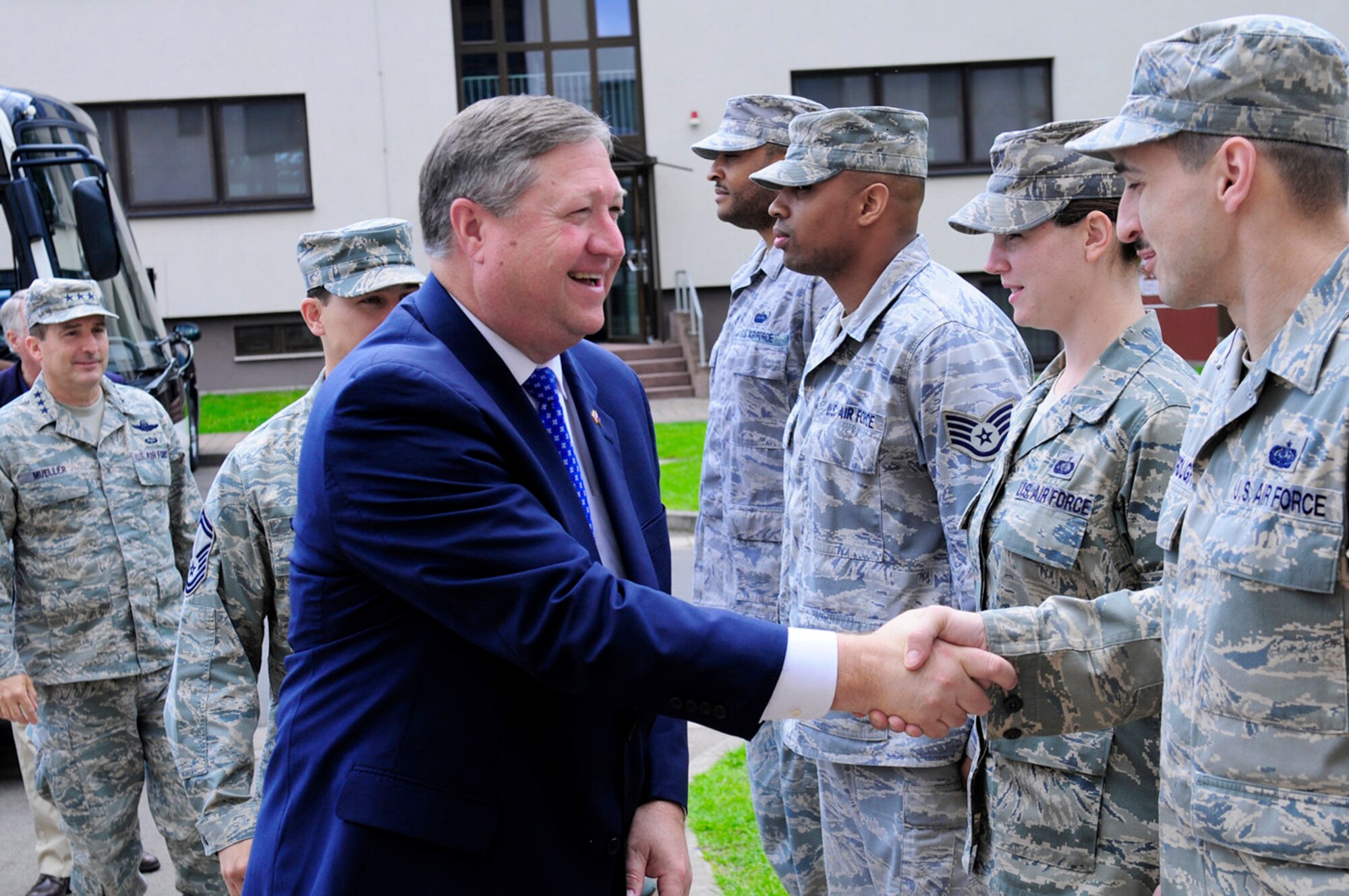 Secretary of the Air Force Michael Donley greets staff members at the Deployment Transition Center at Ramstein Air Base, Germany, June 18, 2011.The secretary traveled to Europe to meet with Airmen and receive updates from command leaders on U.S. Air Forces in Europe efforts to build partnership capacity and ongoing contingency support for Operation Unified Protector. (U.S. Air Force photo/Airman 1st Class Brea Miller)