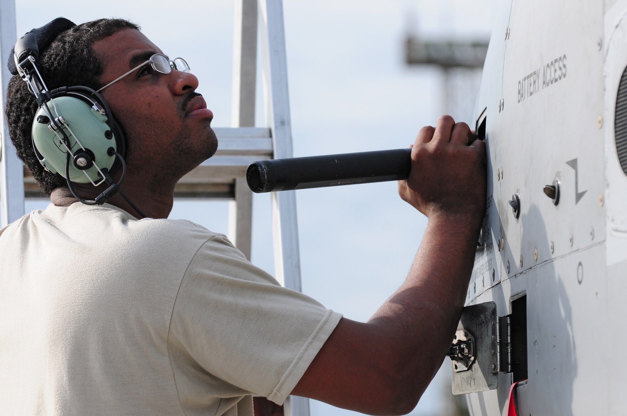 SPANGDAHLEM AIR BASE, Germany – Senior Airman William Jones, 52nd Aircraft Maintenance Squadron aircraft electrical and environmental systems journeyman, inspects an A-10 Thunderbolt II to locate and fix a problem with the canopy here June 16. The 81st Aircraft Maintenance Unit within the 52nd AMXS works to maintain, service, inspect, launch and recover the A-10 Thunderbolt IIs flown by the 81st Fighter Squadron. (U.S. Air Force photo/Airman 1st Class Matthew B. Fredericks)
