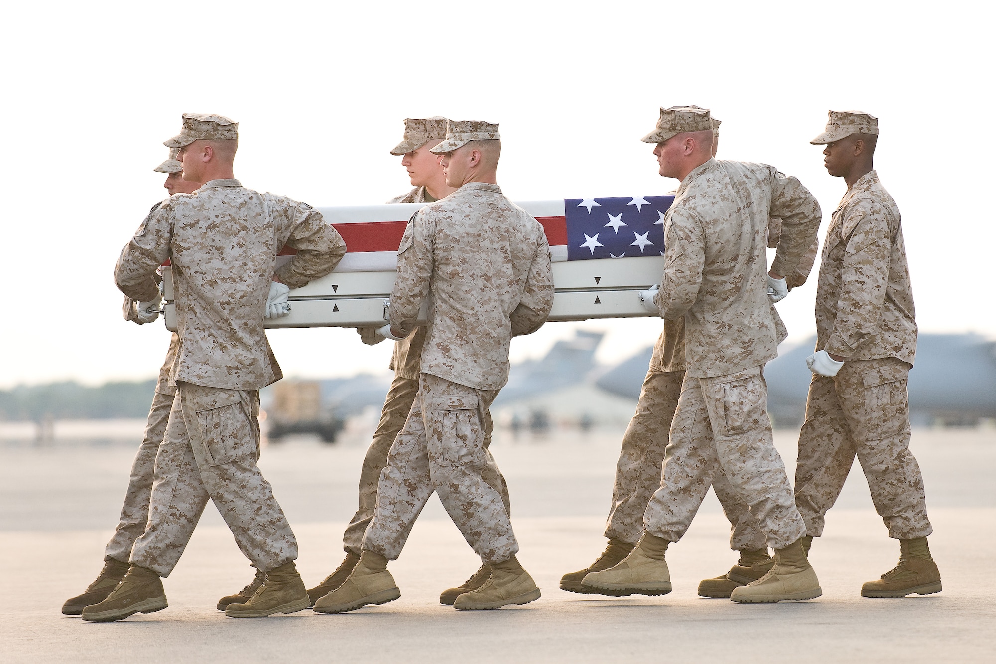 A U.S. Marine Corps carry team transfers the remains of Marine Pfc. Josue Ibarra, of Midland, Texas, at Dover Air Force Base, Del., June 21, 2011. Ibarra was assigned to the 1st Battalion, 12th Marine Regiment, 3rd Marine Division, Kaneohe Bay, Hawaii. (U.S. Air Force photo/Roland Balik)