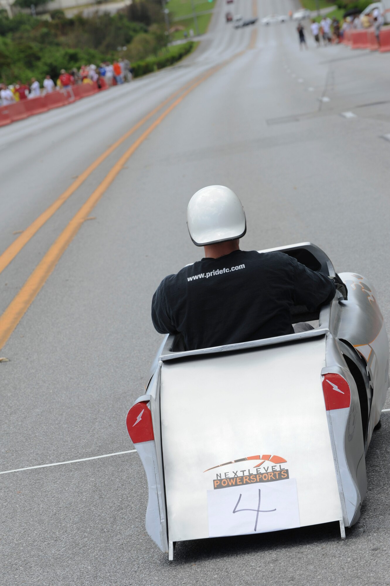 The Douglas Boulevard hill looms before the driver of the B&M Okinawa derby car during the race, June 18. The derby race was part of the Derby Days which was held in an effort to raise money for local volunteer service. (U.S. Air Force photo/Airman 1st Class Brooke P. Beers)