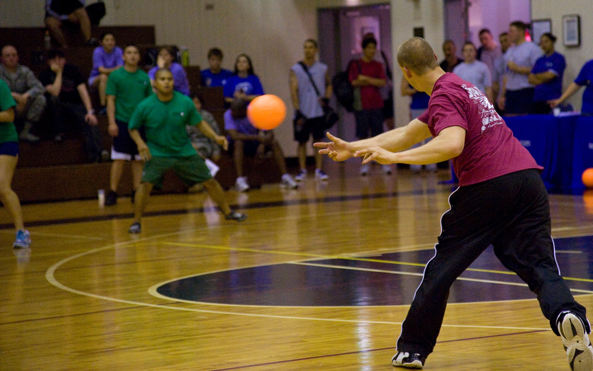 YOKOTA AIR BASE, Japan -- Airman 1st Class James Beck, 374th Logistics Readiness Squadron, throws a dodgeball at the opposing team during a dodgeball tournament June 14, 2011, Yokota Air Base, Japan. Each base dormitory competed against each other in effort to be the number one dorm of the Spring 2011 Dorm STORM hosted by the 374th Force Support Squadron. (U.S. Air Force photo/Airman 1st Class Krystal Garrett)