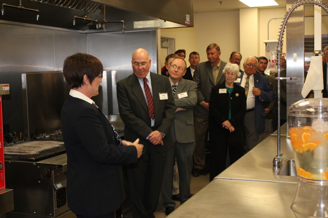 932nd Airlift Wing flight attendants showed off their pride and joy in the flight kitchen area during a tour recently.  This is the preparation area where they cook meals and load food in containers before each flight.  (U.S. Air Force photo/Tech. Sgt. Gerald Sonnenberg)