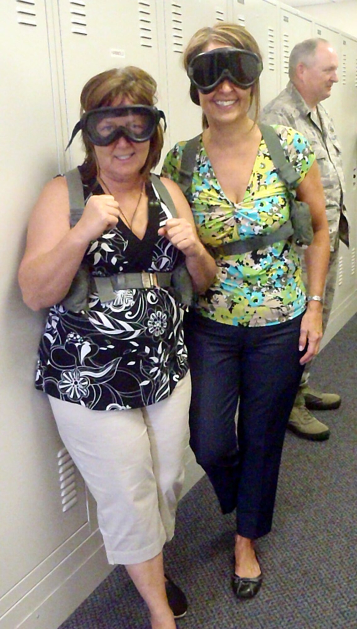 PATRICK AIR FORCE BASE, Fla.- Local civic leaders Deborah Wright, owner of The Green Room Cafe, and Nancy Snyder, Senior Sales Manager for Hilton Melbourne Beach Oceanfront show their excitement before boarding a HH-60G Pave Hawk helicopter here. Local civic leaders had the opportunity to tour the 920th Rescue Wing and fly on the HH-60G or HC-130 P/N King aircraft. The HH-60G is tasked to perform military operations other than war, including civil search and rescue, medical evacuation, disaster response, humanitarian assistance, security cooperation/aviation advisory, NASA space flight support, and rescue command and control.  (U.S. Air Force photo/Senior Airman Amanda Forshaw)
