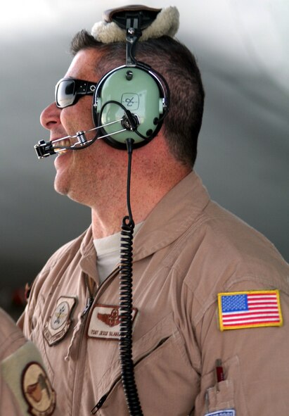 Tech. Sgt. Jesse Talamantes, C-5 flight engineer, works nb a checklist for a C-5M Super Galaxy at bagram Airfield, Afghanistan, on June 5, 2011. Sergeant Talamantes was one of the crew members who flew on a mission that was the Air Force's first direct delivery airlift mission through the Arctic Circle from Dover Air Force Base, Del., to Bagram Airfield, Afghanistan. CSergeant Talamantes is from the 9th Airlift Squadron at Dover AFB and his hometown is Long Beach, Calif.  (U.S. Air Force Photo/Master Sgt. Scott T. Sturkol)
