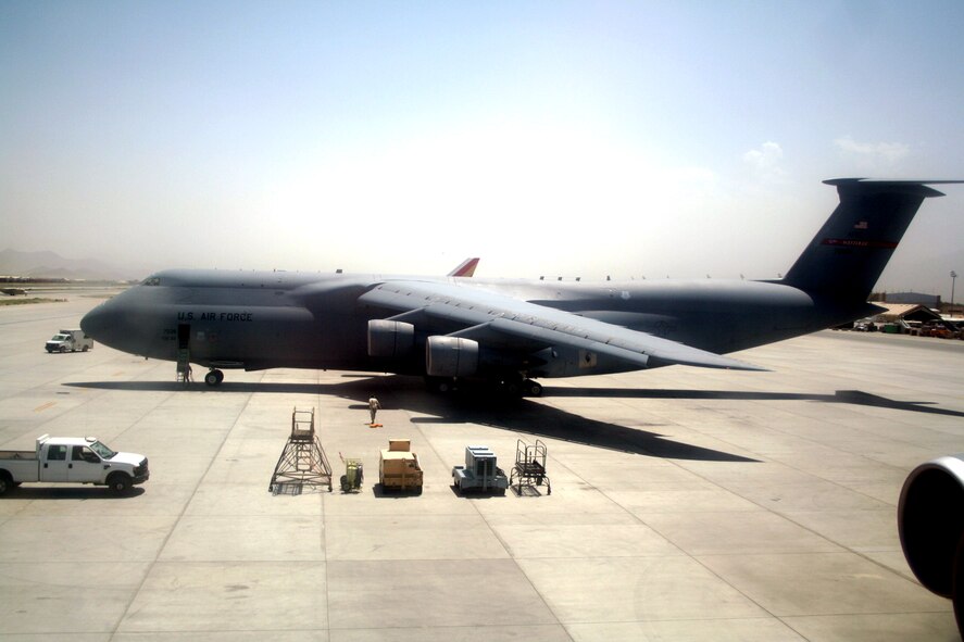 Airmen work on a C-5 Galaxy at Bagram Airfield, Afghanistan, on June 6, 2011. The C-5 is the Air Force's largest airlift aircraft. (U.S. Air Force Photo/Master Sgt. Scott T. Sturkol)