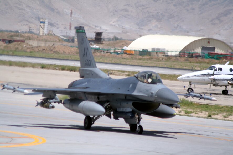 An F-16 Fighting Falcon deployed to Bagram Airfield, Afghanistan, departs for a mission on June 6, 2011. Bagram is home to the 455th Air Expeditionary Wing. (U.S. Air Force Photo/Master Sgt. Scott T. Sturkol)