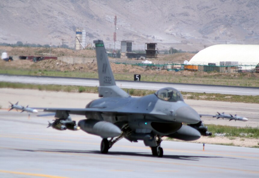 An F-16 Fighting Falcon deployed to Bagram Airfield, Afghanistan, departs for a mission on June 6, 2011. Bagram is home to the 455th Air Expeditionary Wing. (U.S. Air Force Photo/Master Sgt. Scott T. Sturkol)