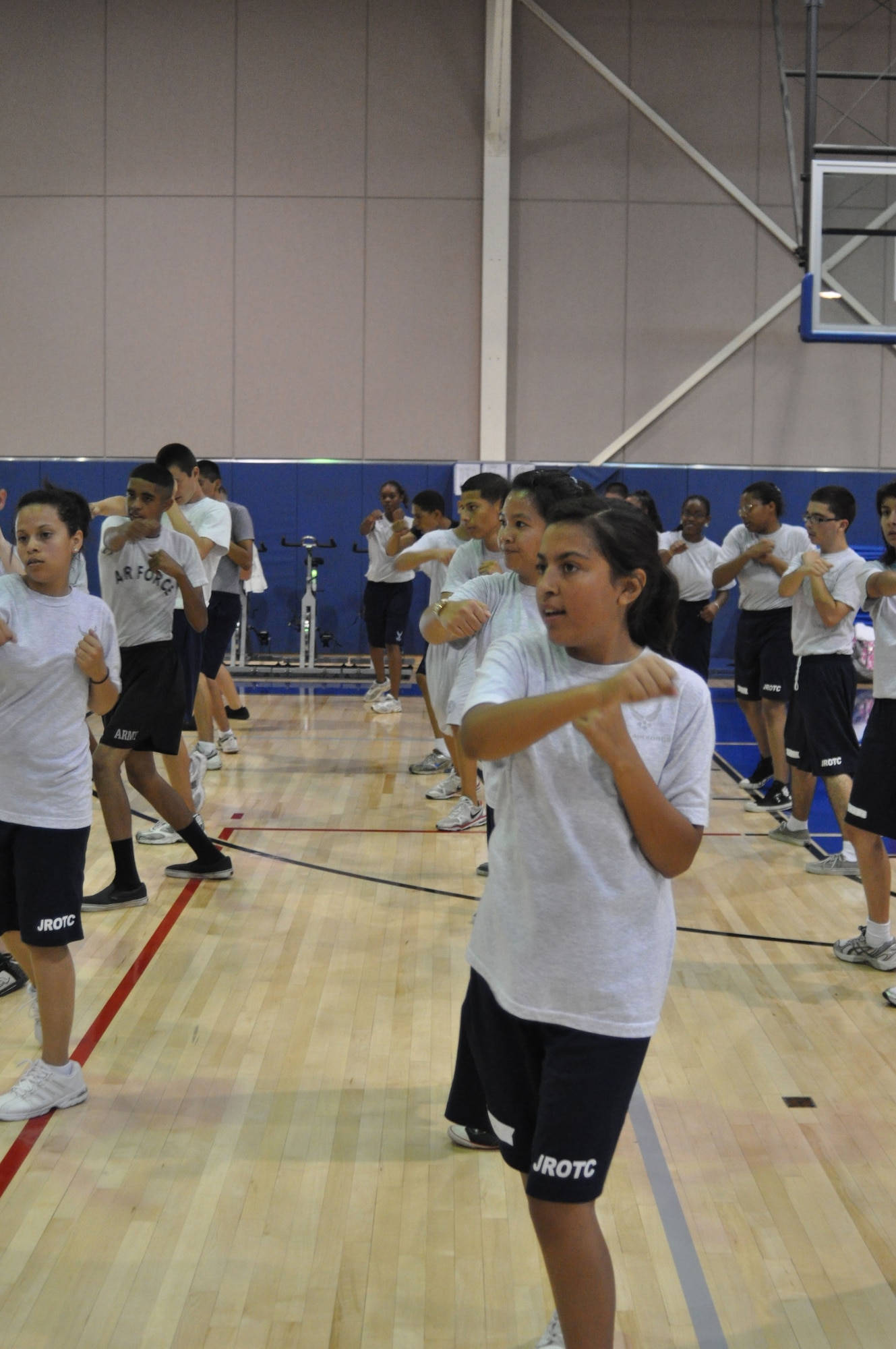 Cadet 2nd Lt. Maria Orona follows the directions of the kickboxing instructor at the fitness center at March Air Reserve Base, Calif., June 15, 2011. Cadet Orona's goal is to become a wing commander in the Air Force. Approximately 50 cadets from Rancho Verde High School in Moreno Valley, Calif., and Arlington High School in Riverside, Calif., participated in the two-week summer leadership school this year. (U.S. Air Force photo/Megan Just)
