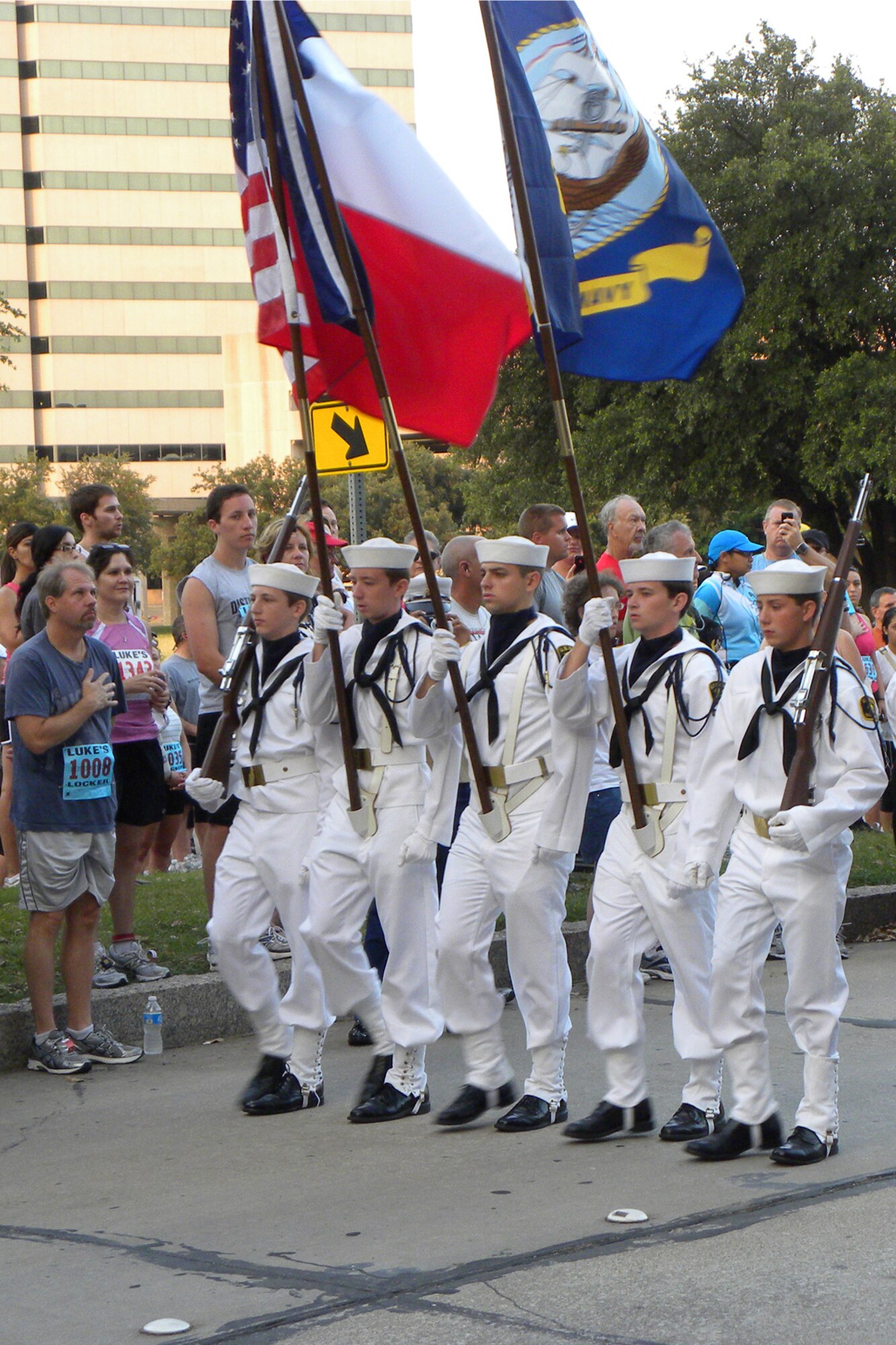 Members of a U.S. Naval Sea Cadet Corps Color Guard from the Lone Star Squadron, Naval Air Station Joint Reserve Base, Fort Worth, Texas, present the colors at the “Wounded Warrior Half Marathon 10K and Military Mile Fun Run” in Los Colinas, Texas, June 12, 2011. According to the Wounded Warrior website, more than 1,500 runners took part in the event to honor our men and women of the military and help raise money for the Semper Fi Fund, which provides assistance to Marines and Sailors injured in post 9-11 combat, and ReserveAid, which gives financial support to Reserve Service Members from all branches of the military. The Lone Star Squadron is commanded by LTJG Jayne Bell, NSCC. (Courtesy photo by Scott Moeller)