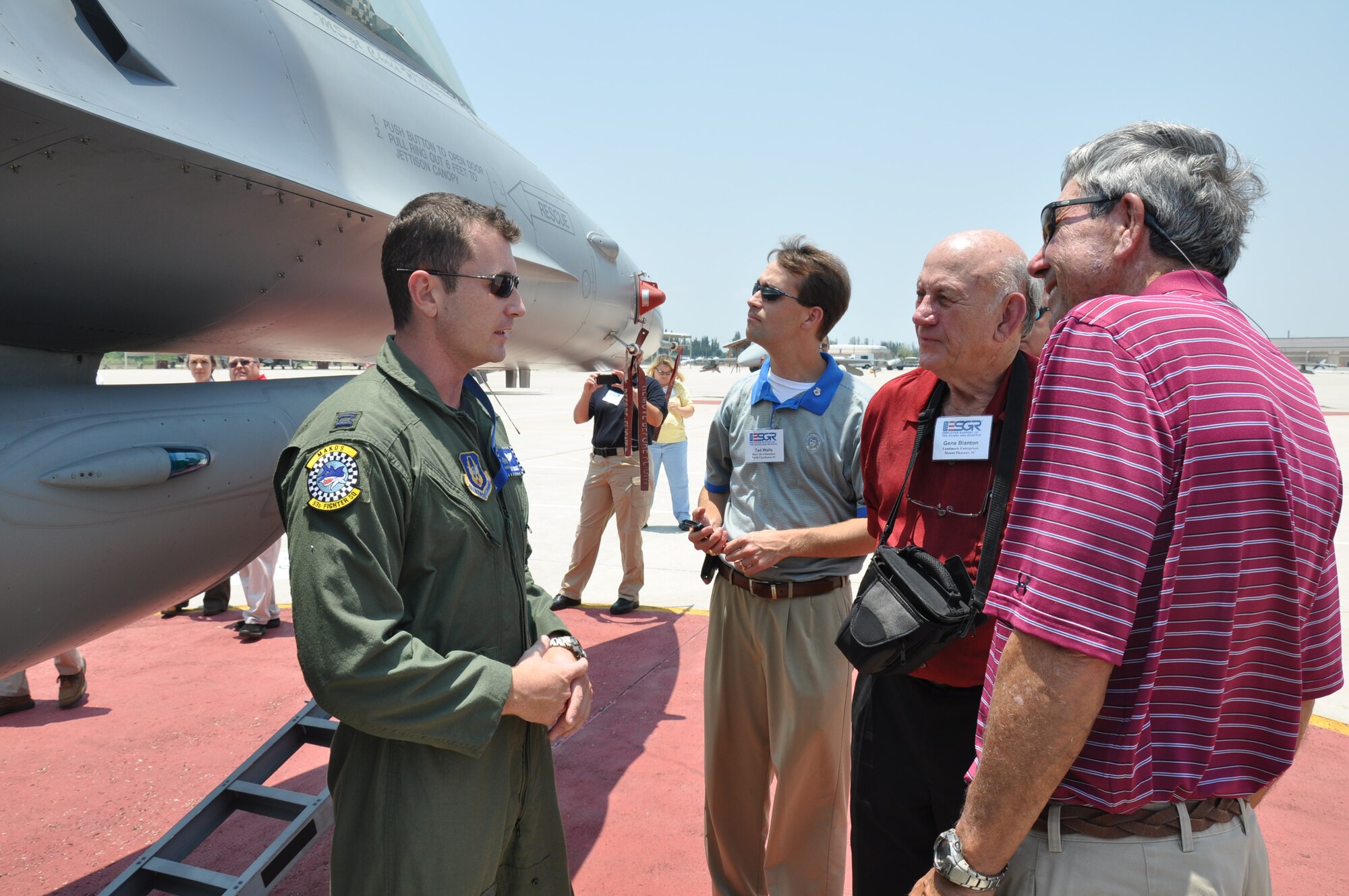 Captain Cliff Lemonie gives a brief tour of a F-16 during the ESGR Bosslift tour at Homestead Air Force base on June 16, 2011. (U.S. Air Force photo, Captain Wayne Capps)