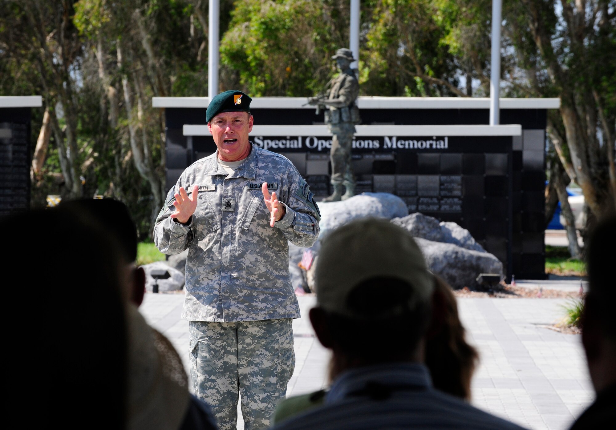 Command Sgt. Major Thomas Smith, United States Special Operations Command, speaks during the 1st Special Forces Group Reunion Memorial Service in honor of fallen comrades at the USSOCOM Memorial Plaza MacDill Air Force Base, Fla., June 20, 2011. The event was part of a five-day long reunion of former members of the 1st Special Forces Group.
(U.S. Air Force photo by Senior Airman Linzi Joseph/Released)
