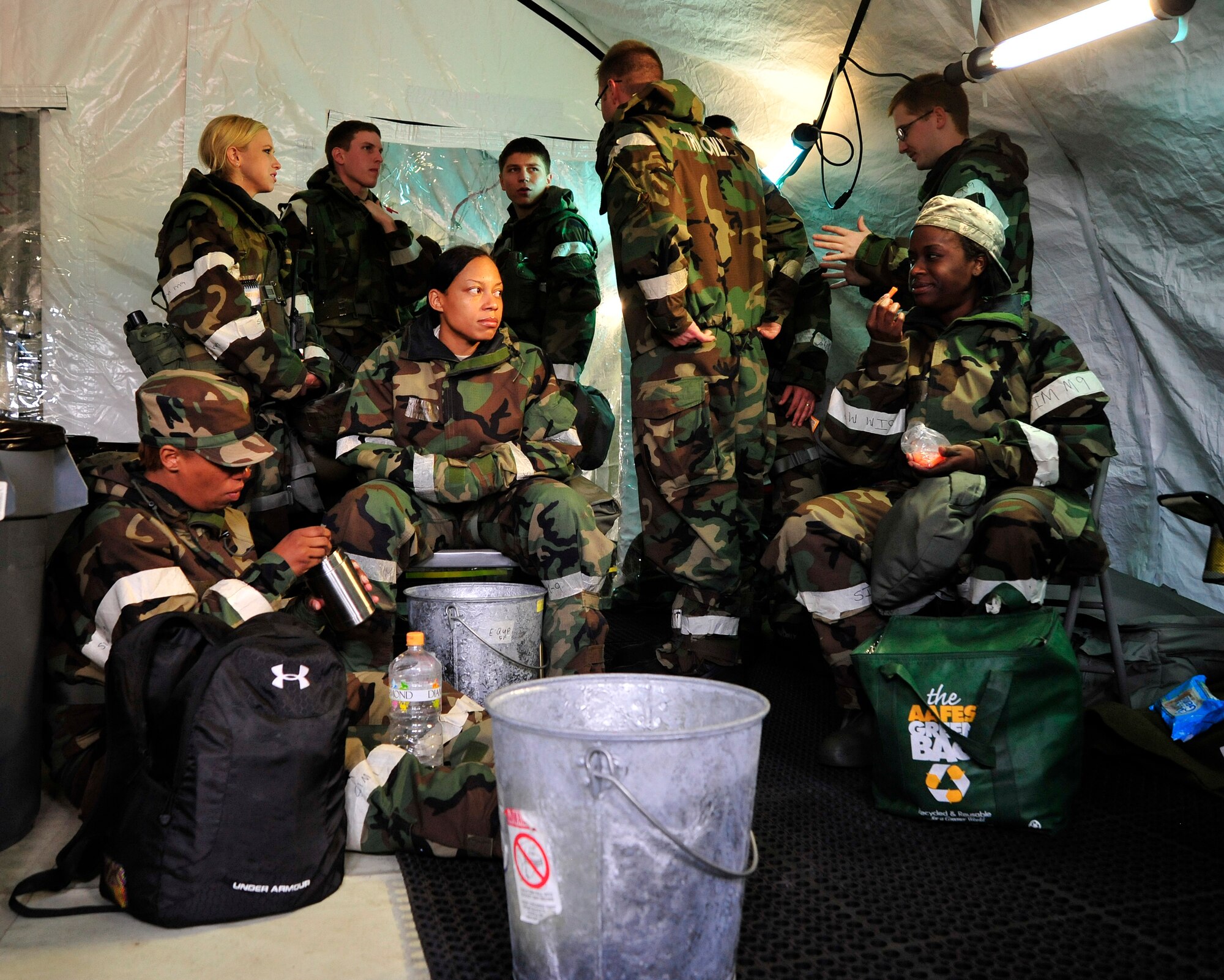MISAWA AIR BASE, Japan -- Members of the deployed medical facility take a break after treating simulated casualties, June 21. During a week-long training exercise, members of the 35th Medical Group operated out of the deployed facility to practice their war-time skills.  (U.S. Air Force photo/Staff Sgt. Nathan Lipscomb)