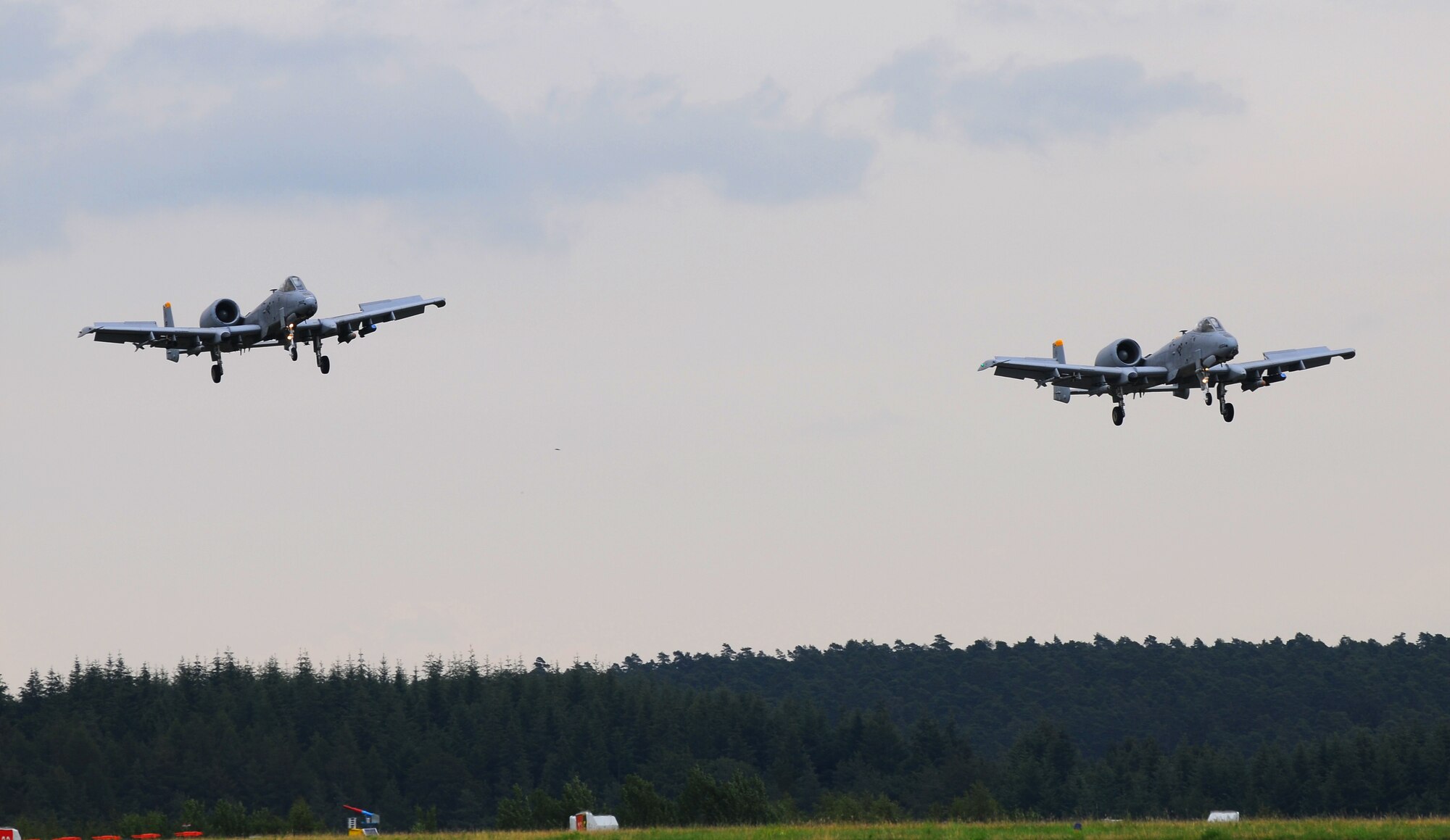 SPANGDAHLEM AIR BASE, Germany – Two 81st Fighter Squadron A-10 Thunderbolt IIs approach the flightline for landing here June 16. Airmen from the 52nd Maintenance Group work to keep the jets operational so pilots from the 81st FS can fly them on training and real-world missions. (U.S. Air Force photo/Airman 1st Class Dillon Davis)