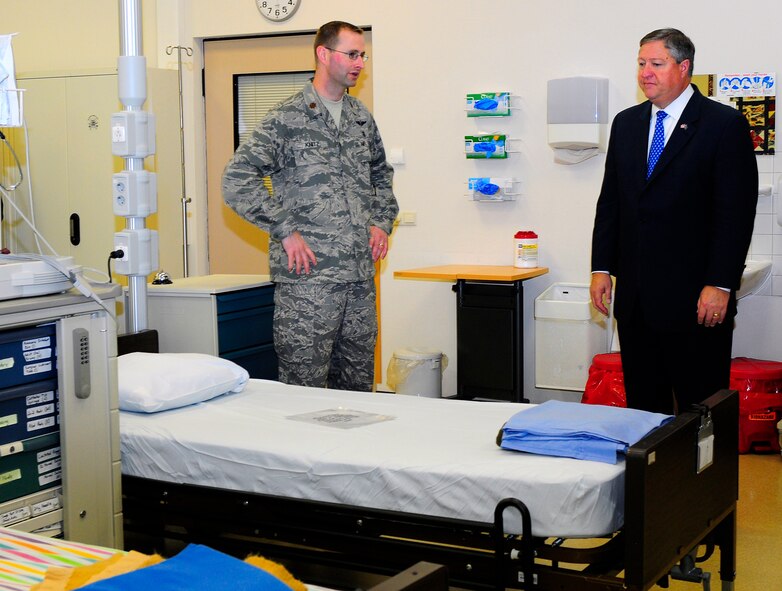 U.S. Air Force Maj. Mark Knitz, Contingency Aeromedical Staging Facilityflight commander, briefs Secretary of the Air Force Michael Donley on CASFoperations at Ramstein Air Base, Germany, June 18, 2011. The secretary traveled to Europe to meet with Airmen and receive updates from command leadership on USAFE efforts to build partnership capacity and ongoing contingency support for Operation Unified Protector. (U.S. Air Force Photo by Airman 1st Class Brea Miller)