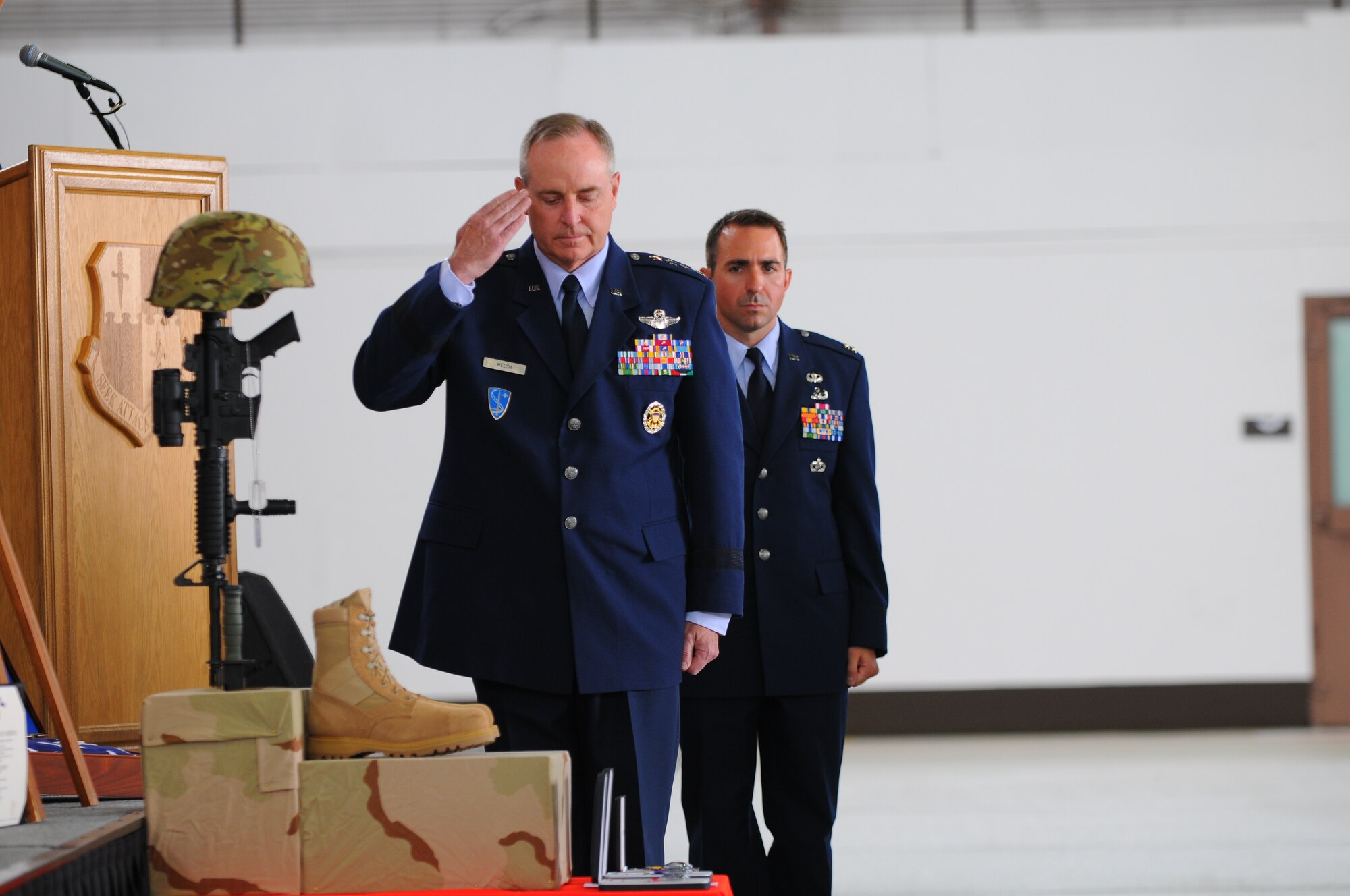 SPANGDAHLEM AIR BASE, Germany – Gen. Mark A. Welsh III, U.S. Air Forces in Europe commander, salutes the Fallen Airman Memorial of Staff Sgt. Joseph J. Hamski, 52nd Civil Engineer Squadron Explosive Ordnance Disposal Flight, after posthumously presenting him the Bronze Star, Purple Heart and Air Force Commendation Medals during Sergeant Hamski’s memorial service here June 16. Sergeant Hamski was killed in action May 26, 2011, in Shorabak, Afghanistan, while responding to a known enemy weapons cache. (U.S. Air Force photo/Airman 1st Class Dillon Davis)