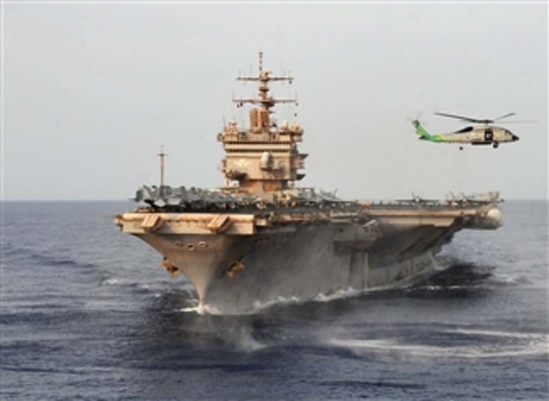 An HS-60B Sea Hawk helicopter assigned to Helicopter Anti-submarine Squadron 11, takes off from the aircraft carrier USS Enterprise (CVN 65) as the ship transits the Gulf of Aden on June 7, 2011.  The Enterprise is conducting maritime security operations in the U.S. 5th Fleet area of responsibility.  